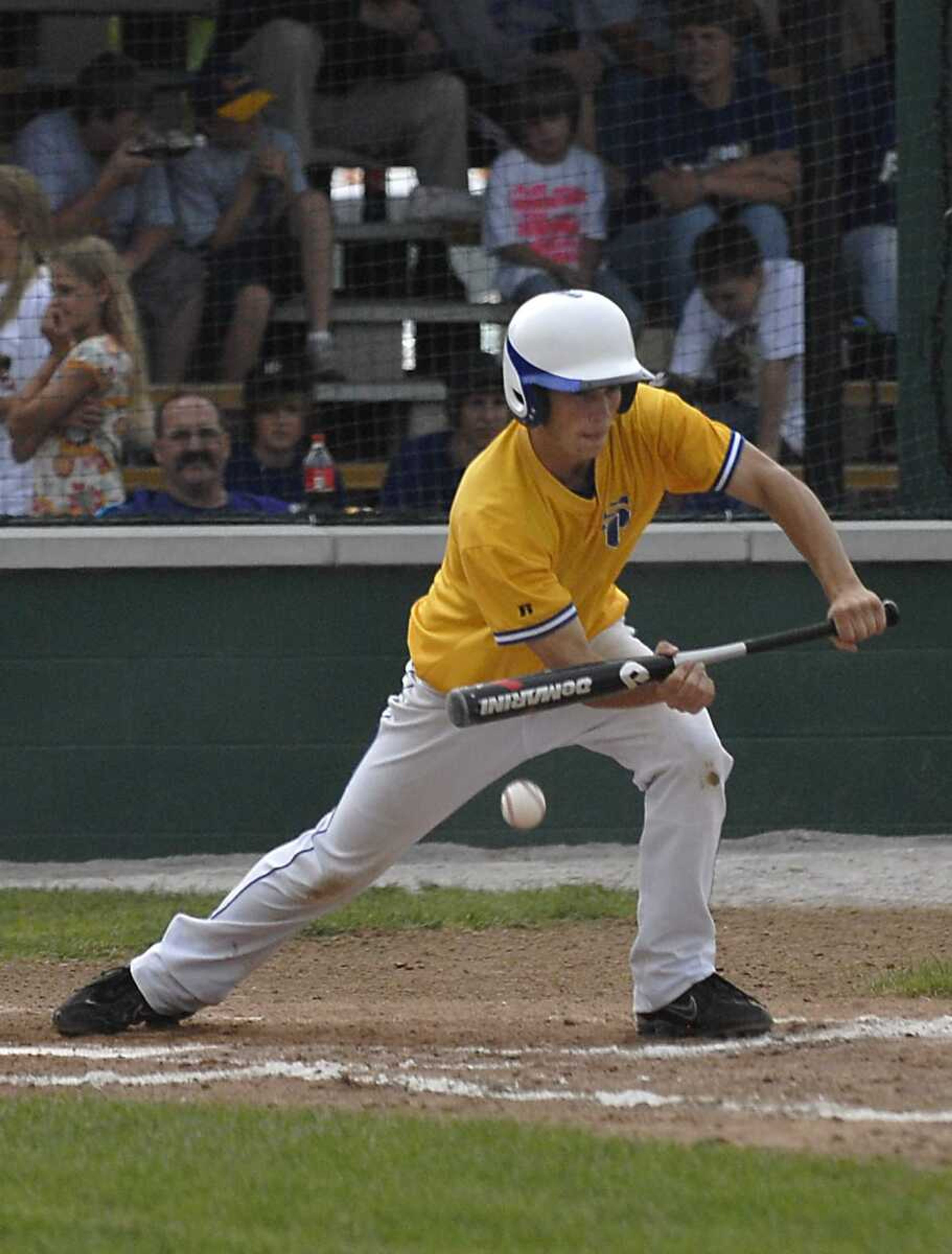 KIT DOYLE ~ kdoyle@semissourian.com
Scott City's Josh Henson laid down a bunt Wednesday, May 28, 2008, and reached first during the Class 2 Semifinal at Meador Park in Springfield.