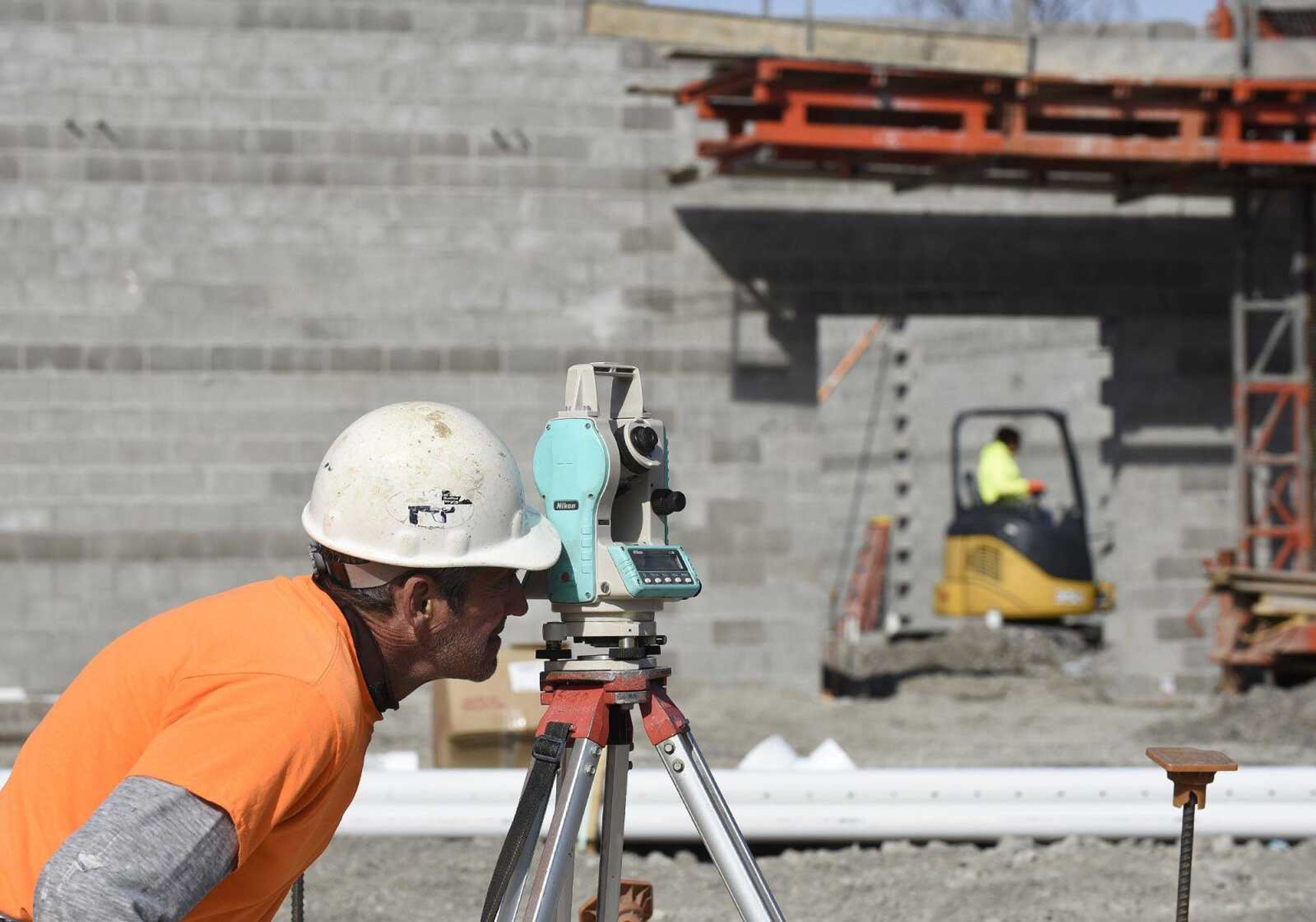 Chris Heisserer of Kiefner Brothers Inc. surveys the site Friday of the new Cape Girardeau Police Department station to set the center lines for the steel erection.