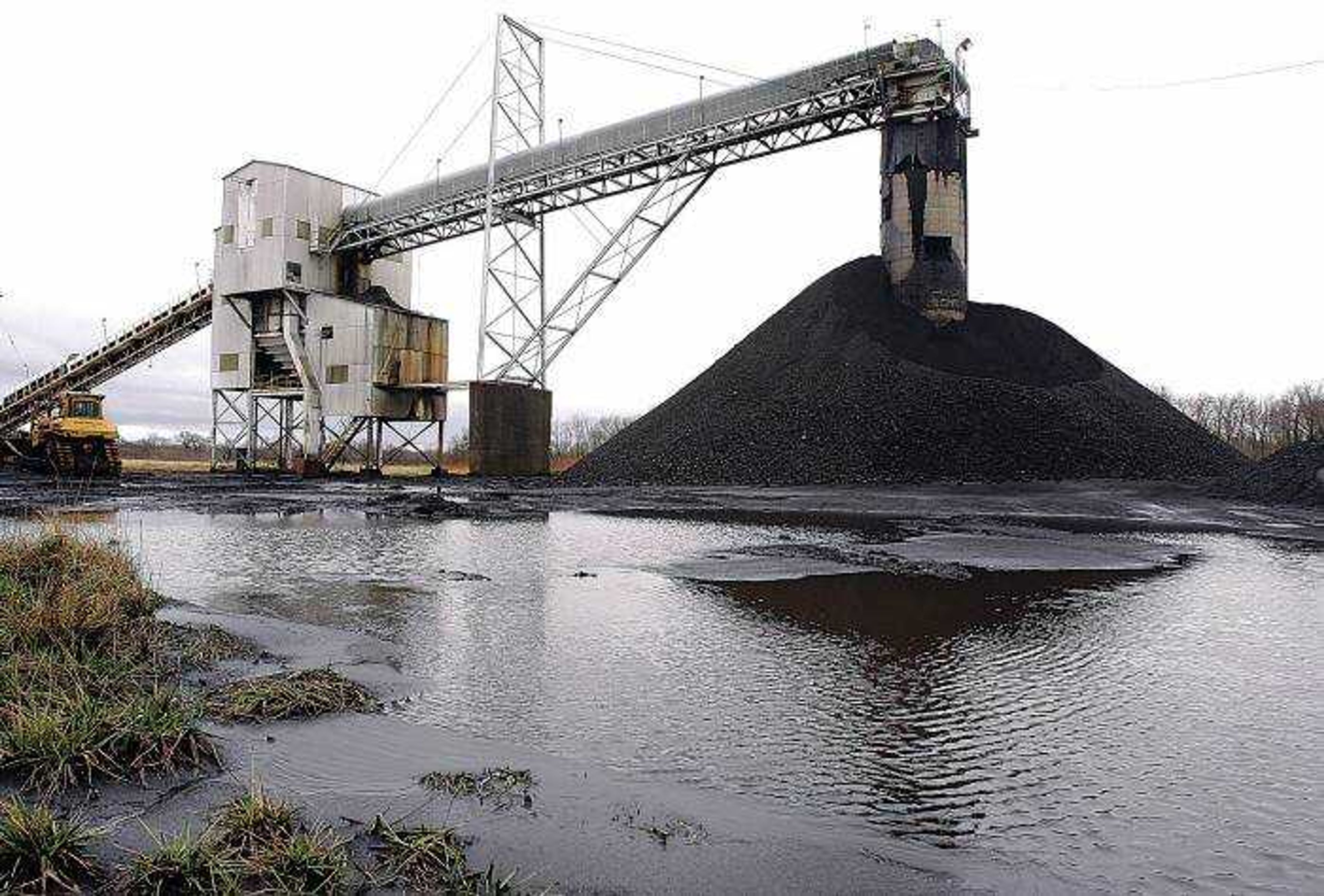 A conveyor belt moved coal to the surface at Peabody Energy's Gateway Mine near Coulterville, Ill. Illinois' once shunned high-sulfur coal is enjoying a comeback because of technology that can convert it into a cleaner-burning fuel that could power tomorrow's big-rig trucks or pollution-free cars. (Associated Press)