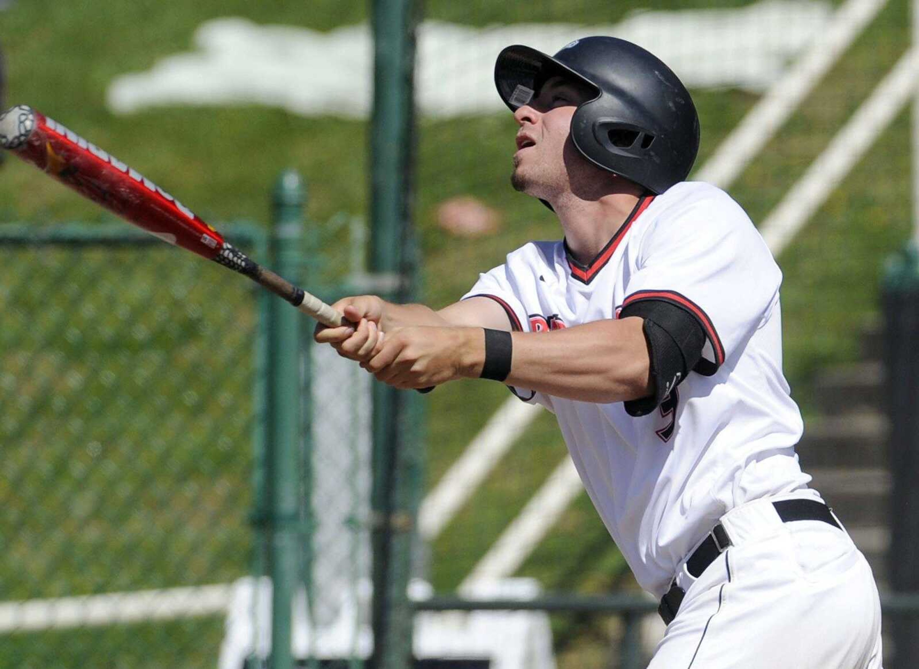 Southeast Missouri State's Branden Boggetto doubles against Eastern Illinois to score Trevor Ezell during the sixth inning Sunday, April 17, 2016 at Capaha Field.