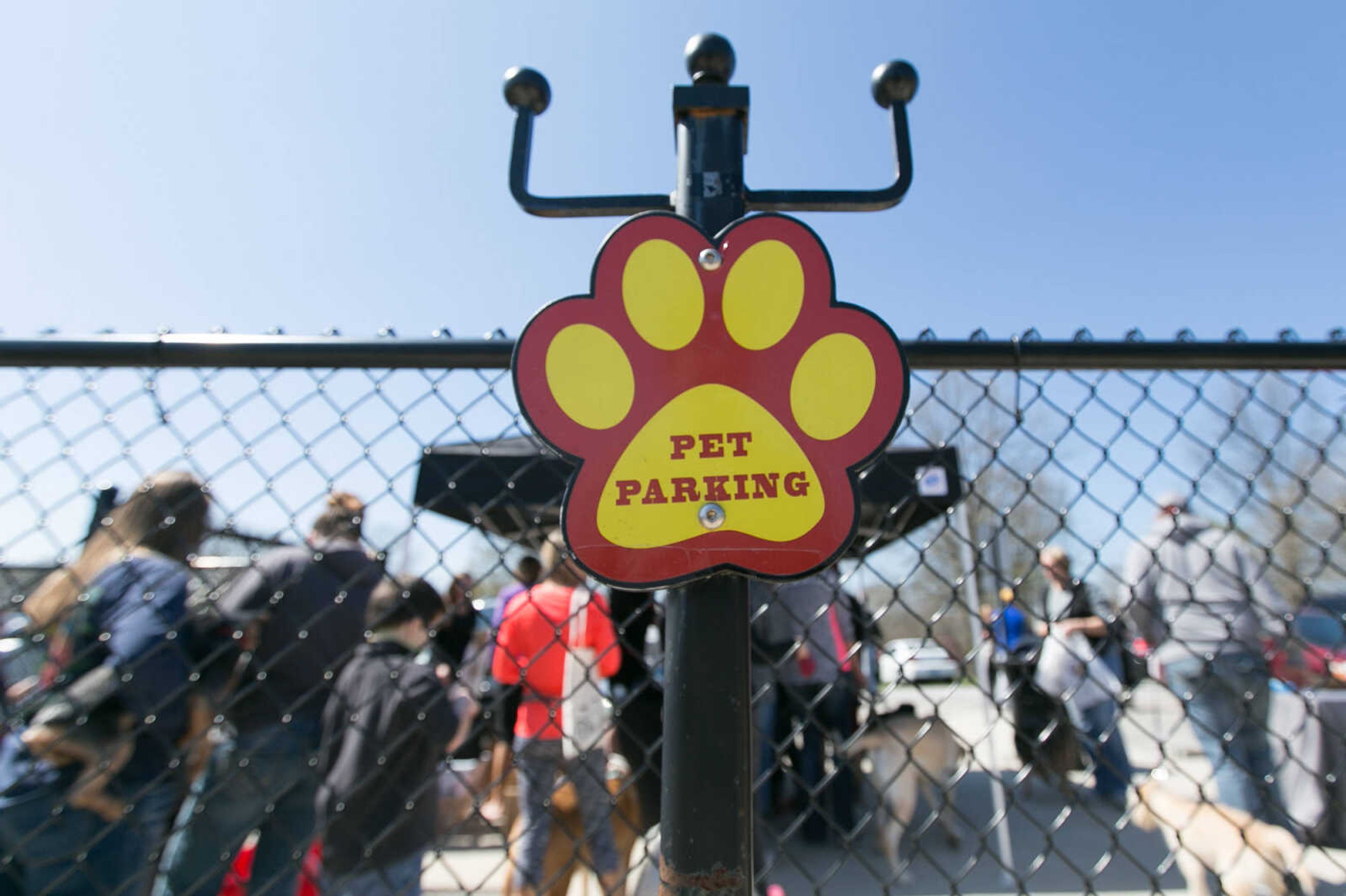 GLENN LANDBERG ~ glandberg@semissourian.com

Dogs and their owners take to Dog Town in Kiwanis Park, Saturday, March 26, 2016 for the Peeps for Paws dog Easter egg hunt.