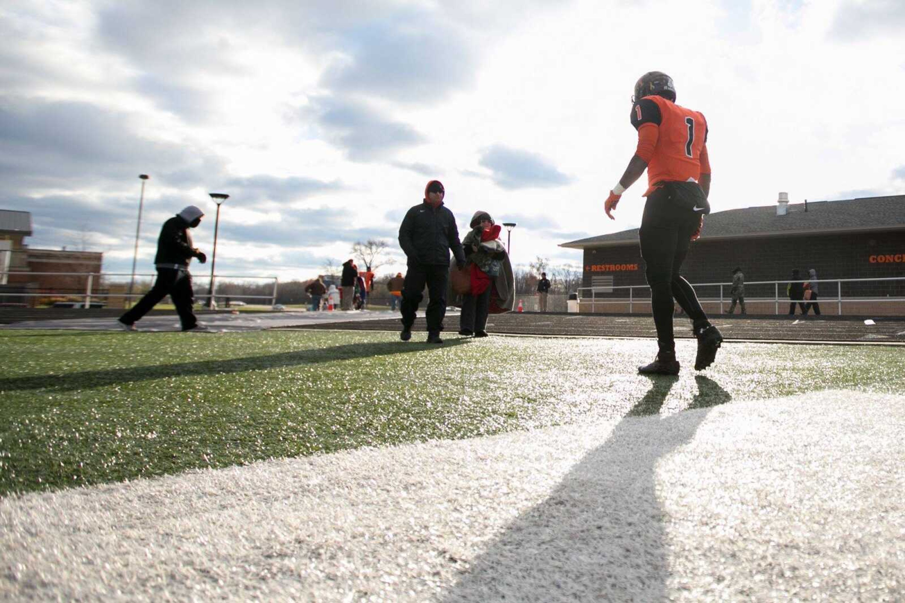 Cape Central's Al Young walks off the field after their 35-14 loss against Webb City during a Class 4 semifinal Saturday, Nov. 21, 2015 at Cape Central High School.