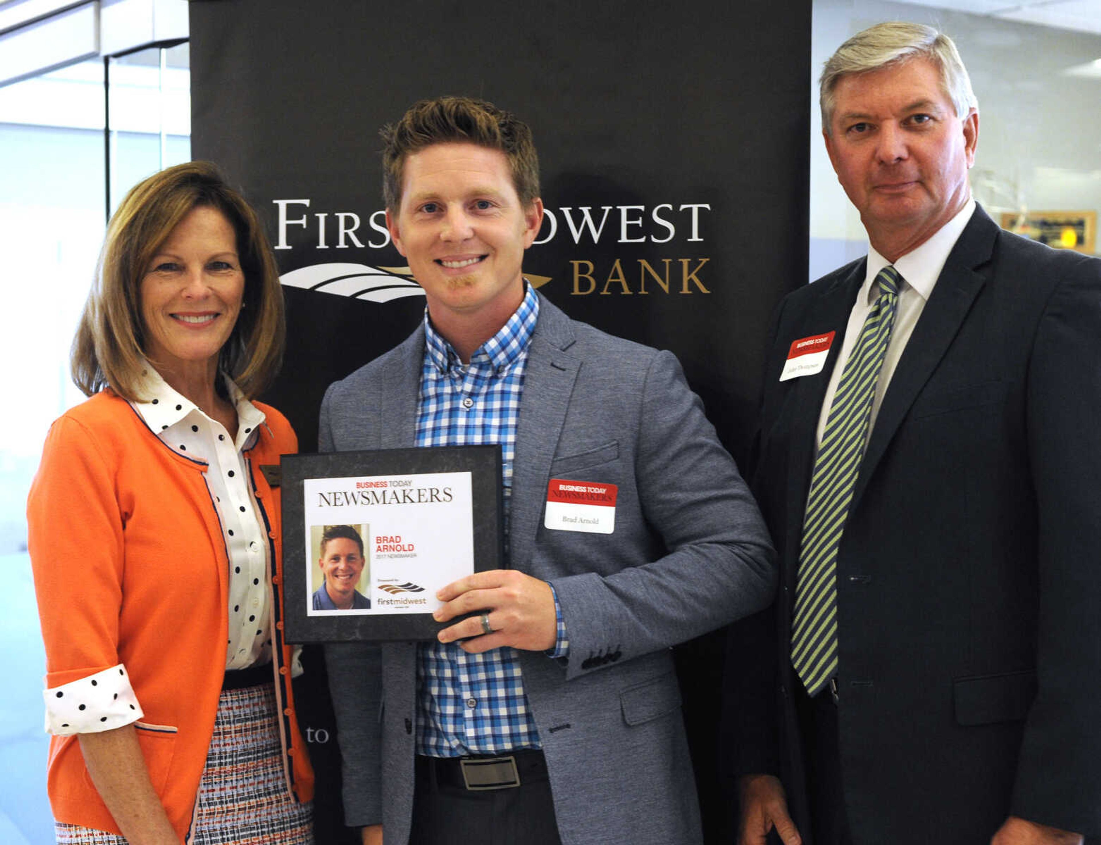 FRED LYNCH ~ flynch@semissourian.com
Brad Arnold poses for a photo with Kathy Bertrand, First Midwest Bank community bank president, Cape Girardeau, and John N. Thompson, First Midwest Bank community bank president, Jackson, Wednesday, Sept. 6, 2017 during the Business Today Newsmakers awards reception at First Midwest Bank in Cape Girardeau.