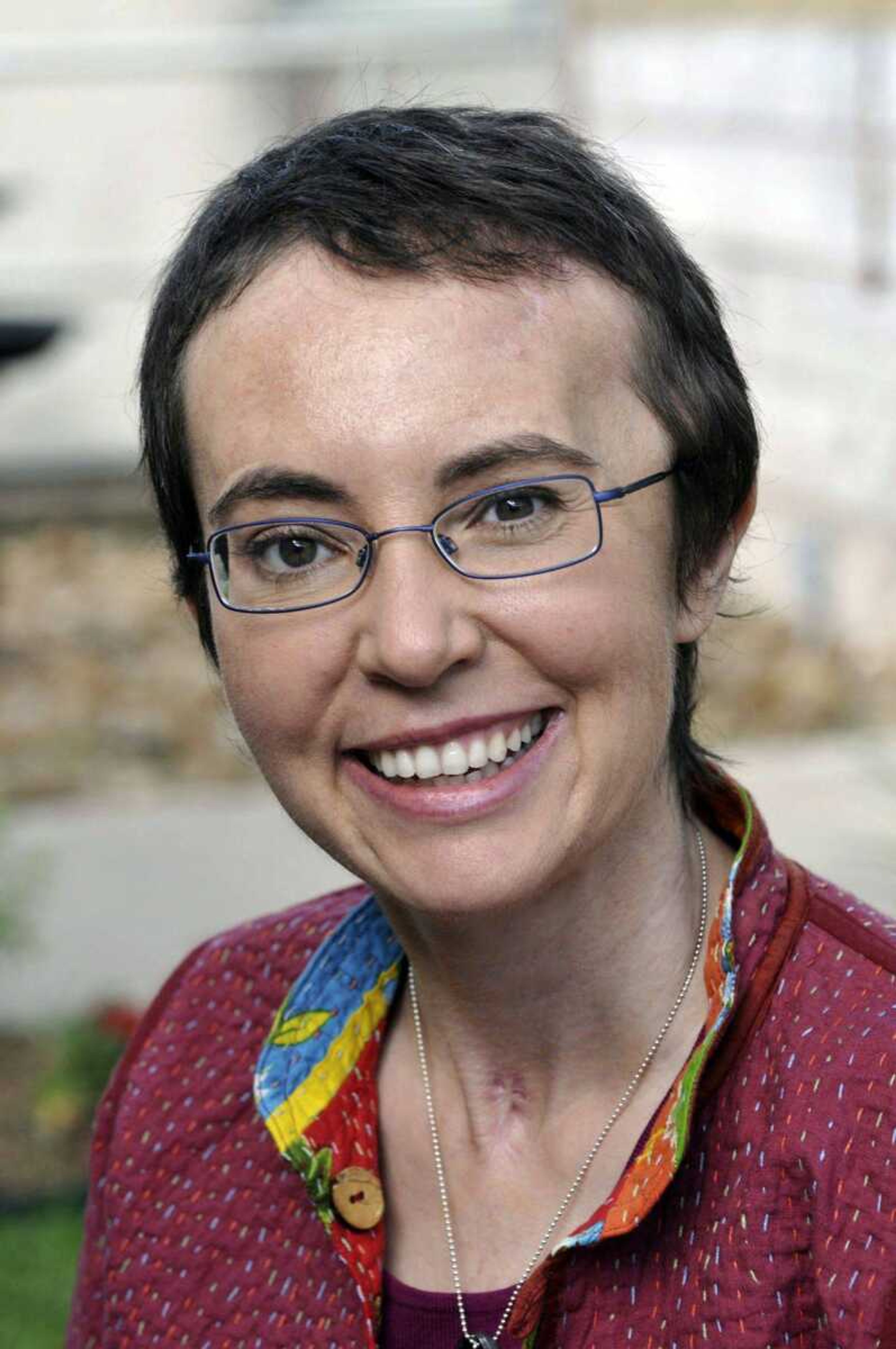 In this May 17 file photo, U.S. Rep. Gabrielle Giffords is seen at TIRR Memorial Hermann Hospital in Houston. The Arizona Republic reports that C.J. Karamargin confirmed Friday, Aug. 19, 2011, that the Democratic politician was told in late July the names of the dead, including aide Gabe Zimmerman, U.S. District Judge John Roll, and 9-year-old Christina-Taylor Green. (AP Photo/southwestphotobank.com, P.K. Weis, File)