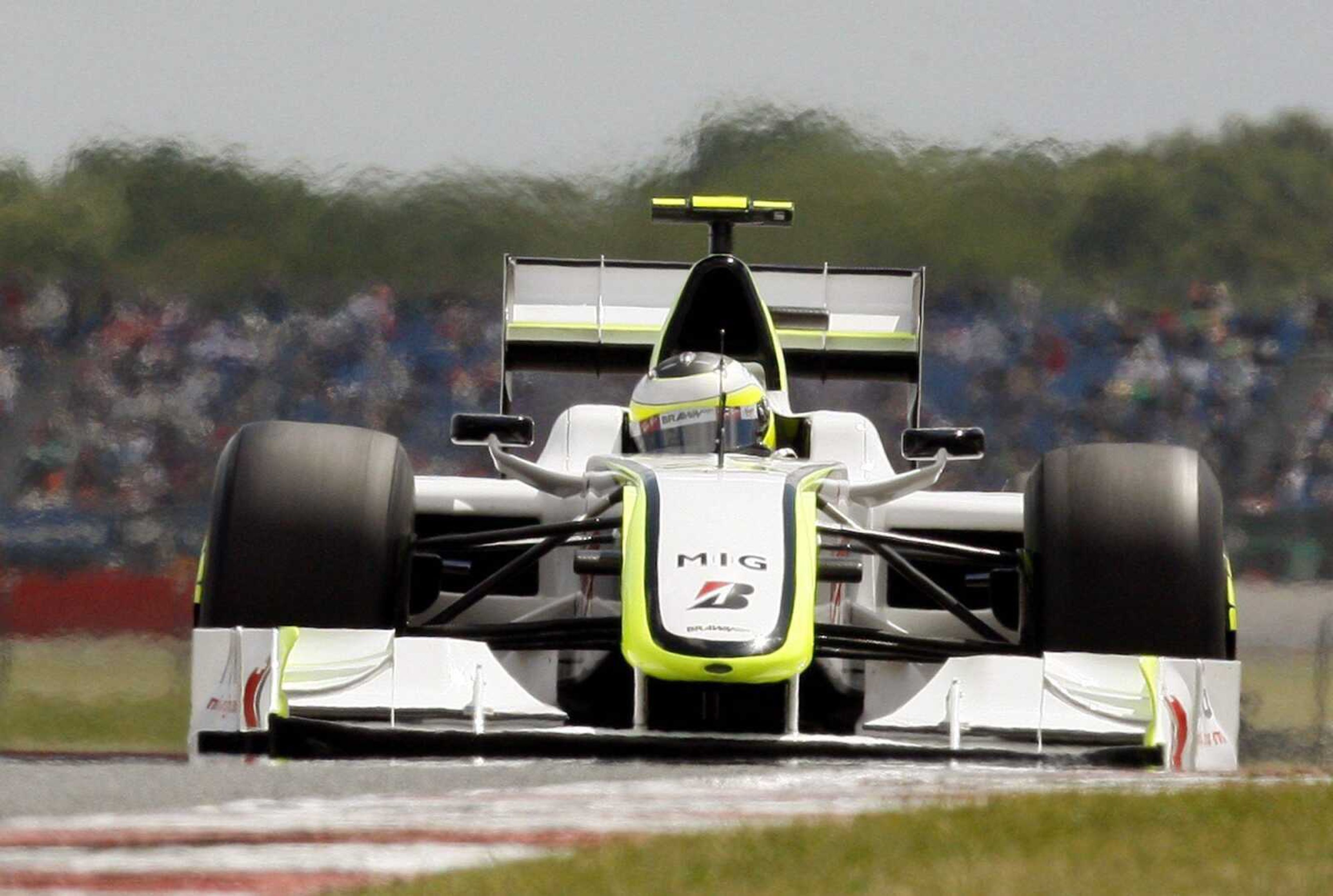 Brawn GP driver Jenson Button of Britain practices Friday for the British Formula One Grand Prix at the Silverstone racetrack, in Silverstone, England.  Brawn GP is among the eight teams that plan to drop out of Formula One next season for a new league. (Luca Bruno ~ Associated Press)