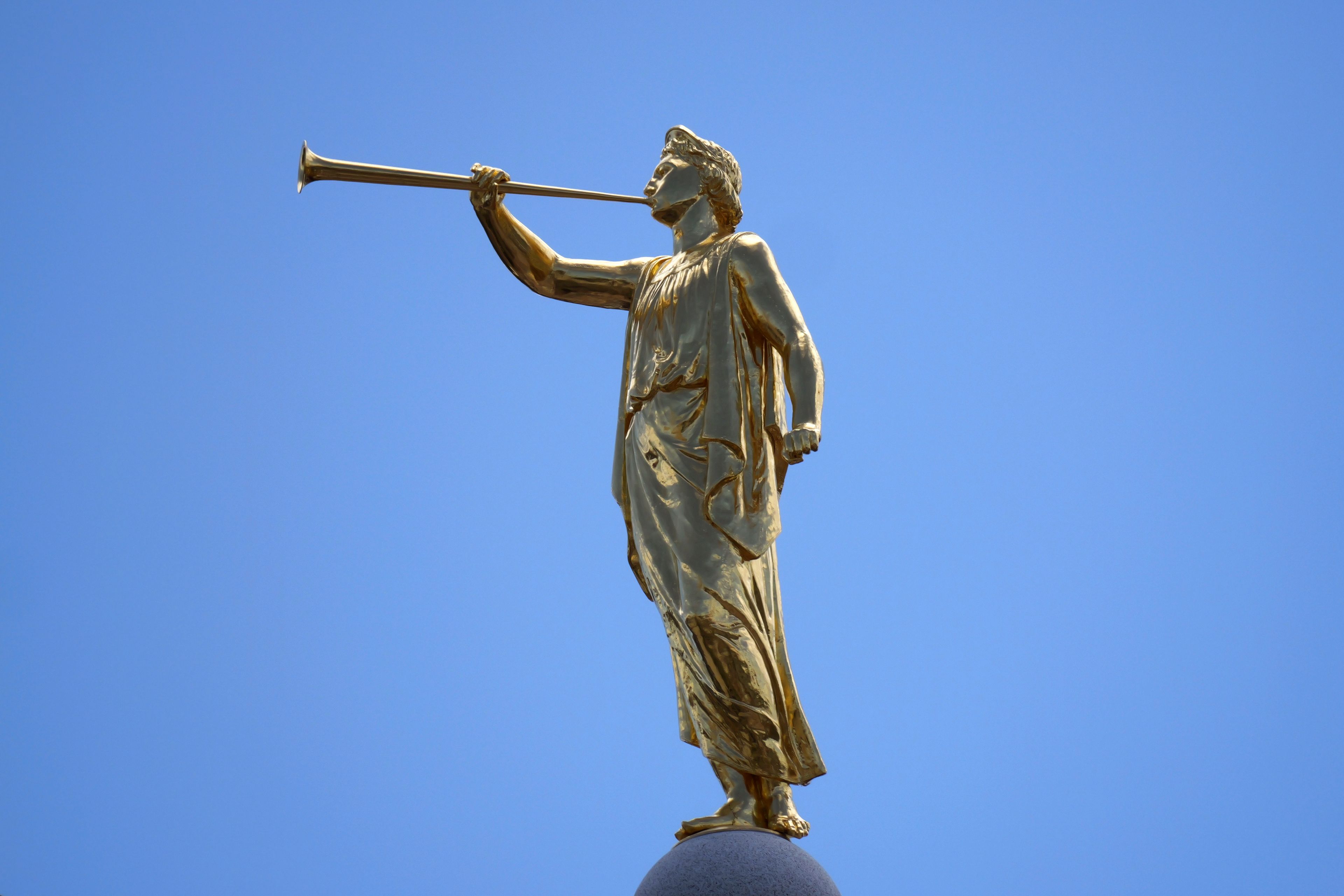 The angel Moroni statue sits atop the Salt Lake Temple of The Church of Jesus Christ of Latter-day Saints at Temple Square during an ongoing renovation project June 17, 2024, in Salt Lake City. (AP Photo/Rick Bowmer)