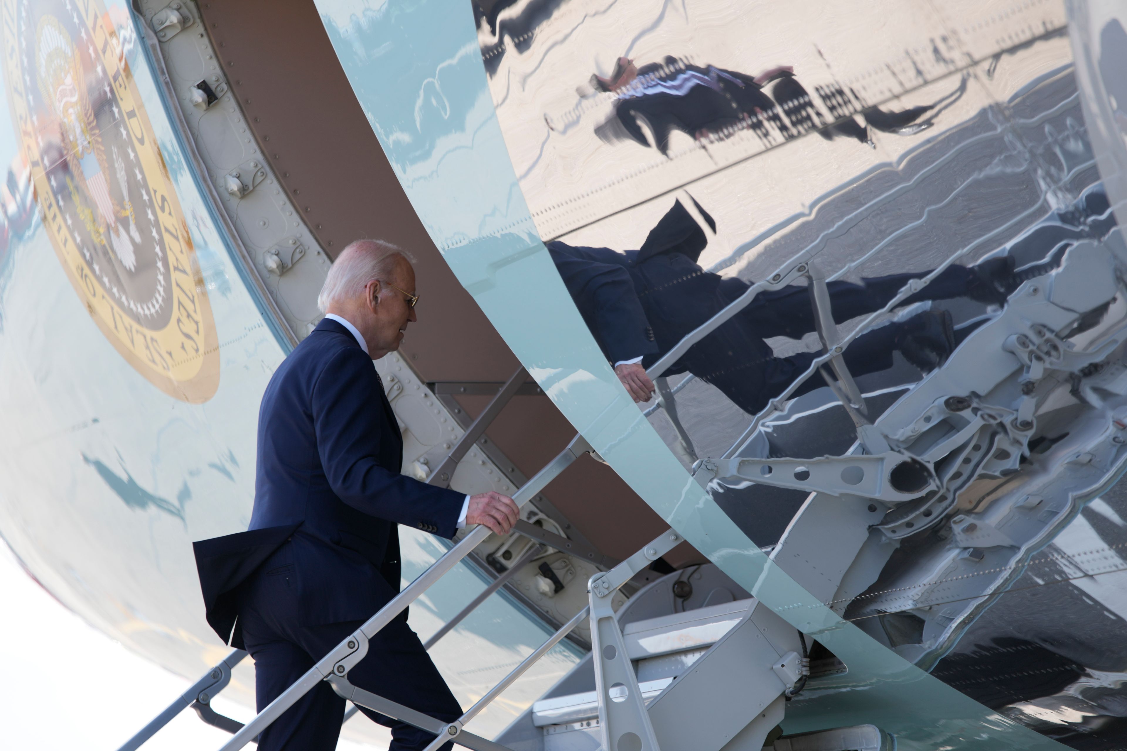 President Joe Biden boards Air Force One at Quatro de Fevereiro International Airport in Luanda, Angola, on Wednesday, Dec. 4, 2024. (AP Photo/Ben Curtis)