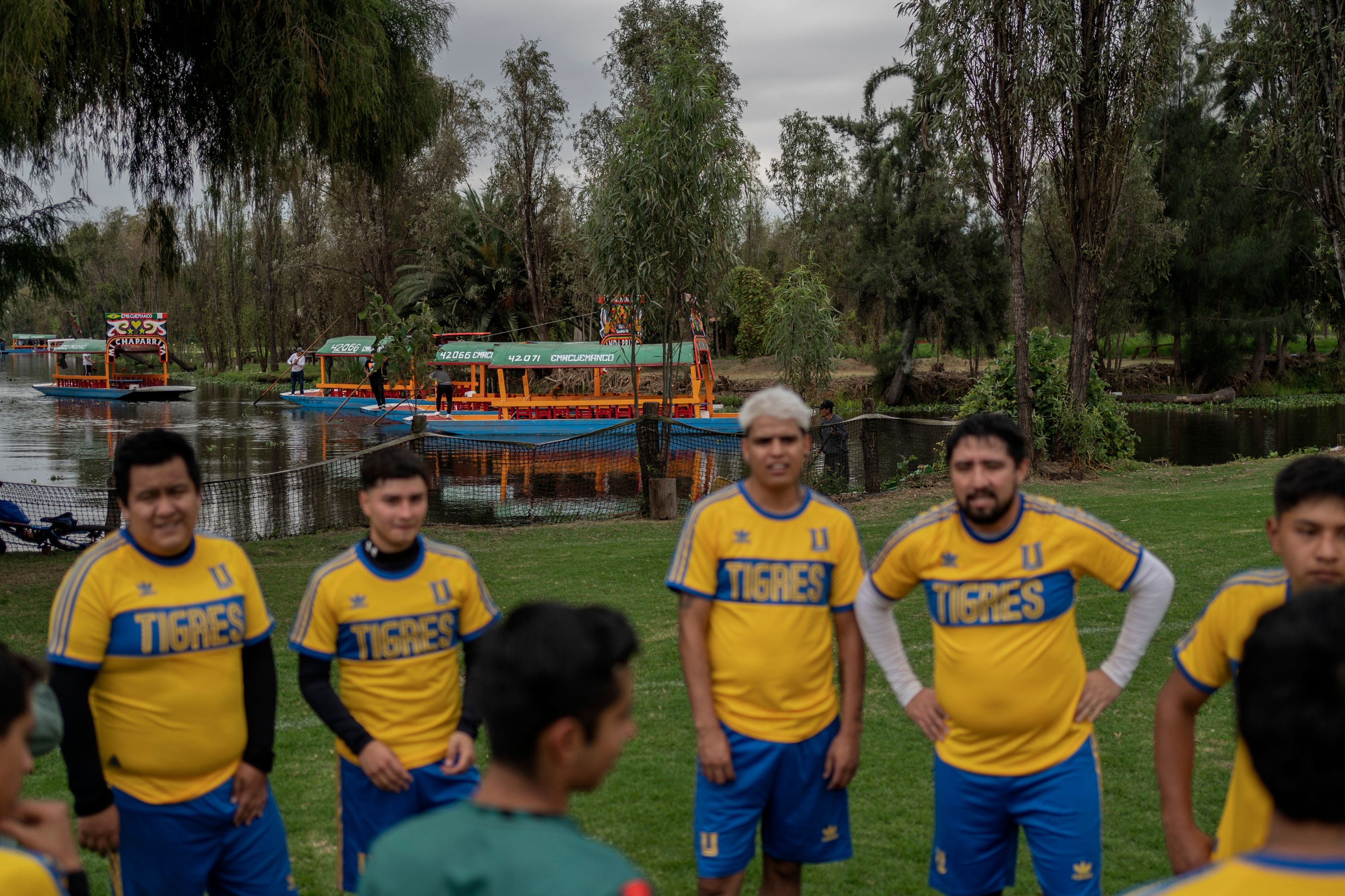 Amateur players take a break on a soccer field in the Xochimilco borough of Mexico City, Sunday, Oct. 20, 2024. (AP Photo/Felix Marquez)