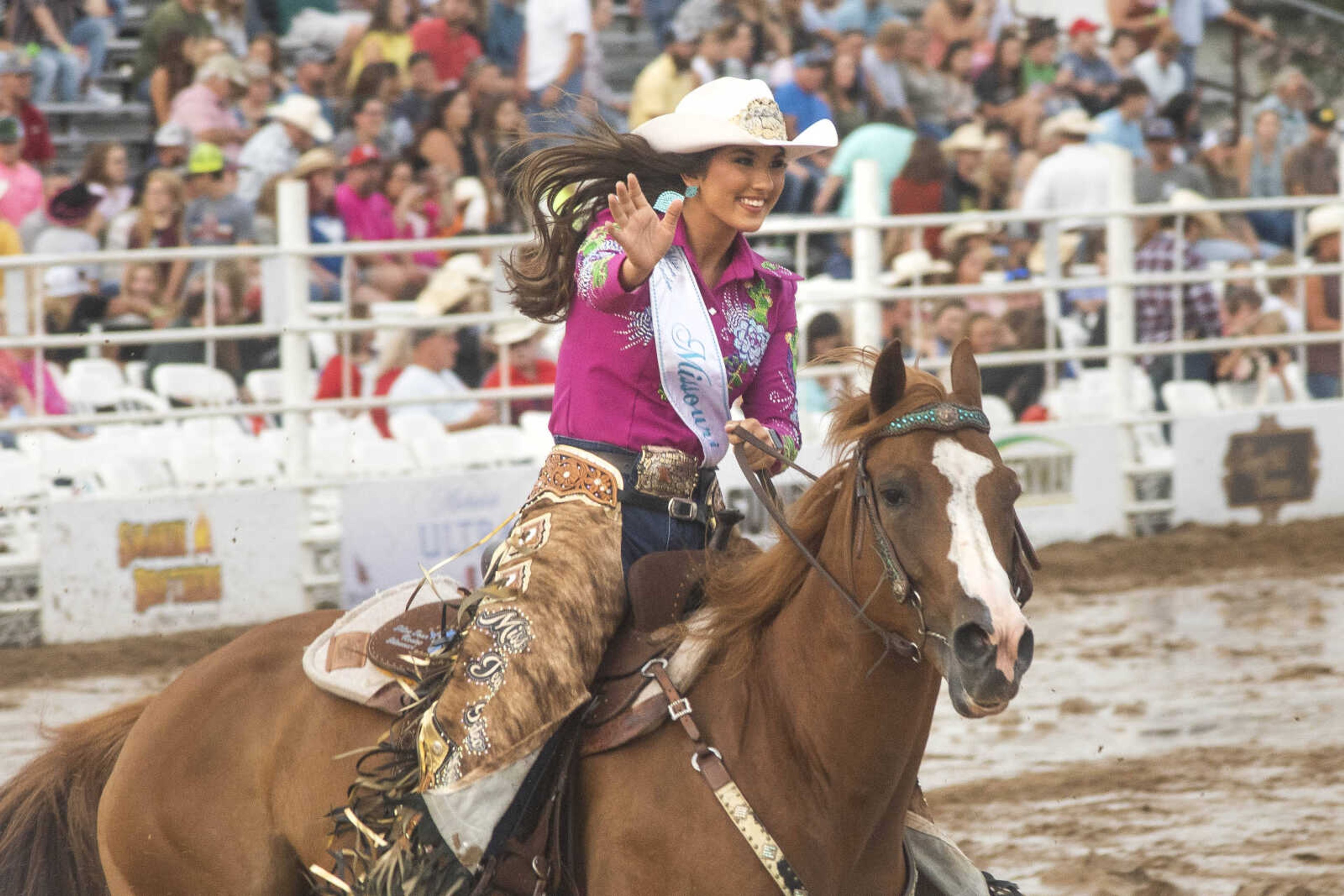 A performer waves to the crowd before the third night of the Sikeston Jaycee Bootheel Rodeo Friday, Aug. 13, 2021,&nbsp;&nbsp;in Sikeston, Missouri.