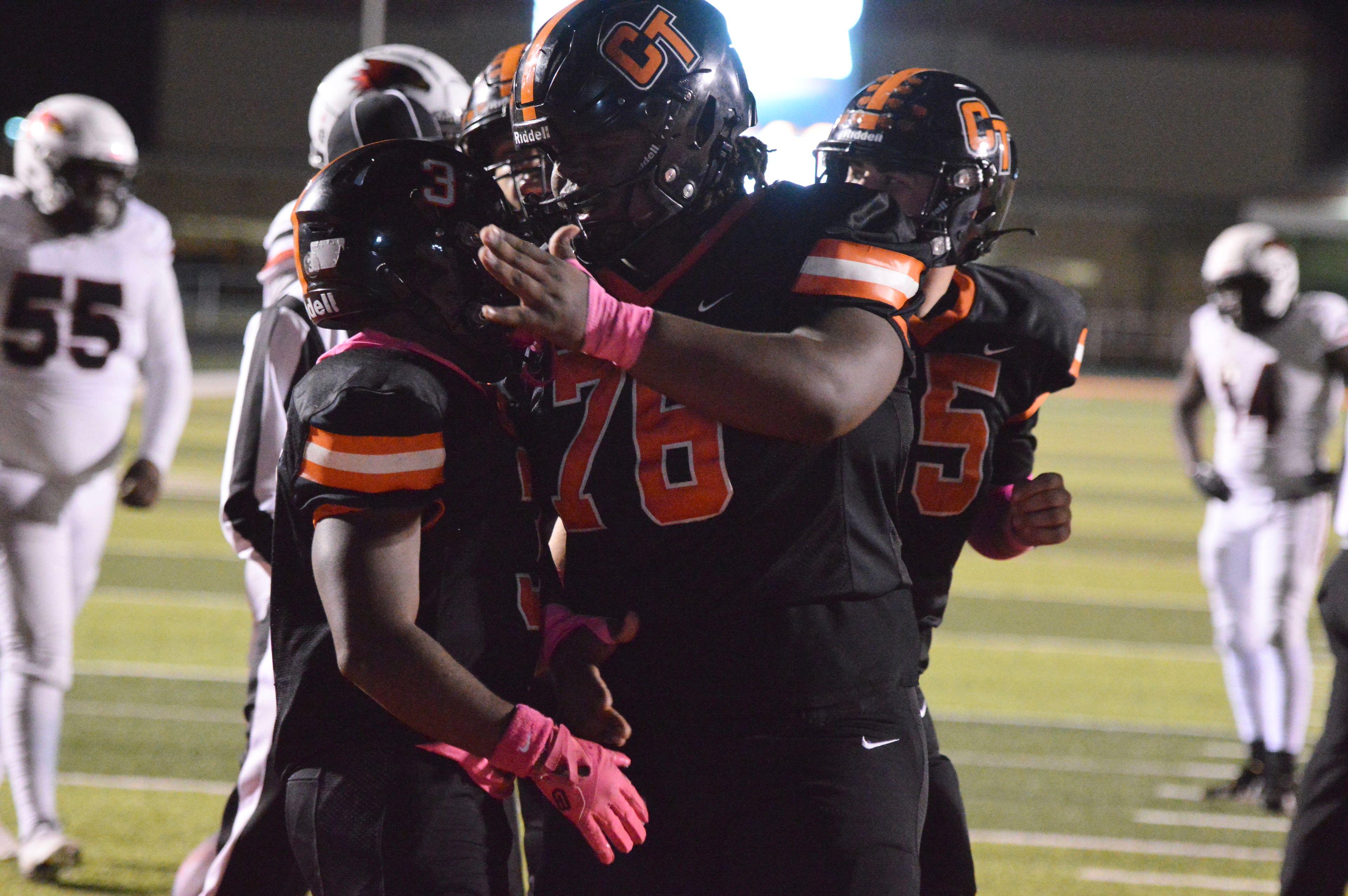 Cape Central running back Zai'Aire Thomas, left, celebrates a rushing touchdown with senior offensive lineman Kameron Bird, right, against Lift for Life Academy on Friday, Oct. 18.