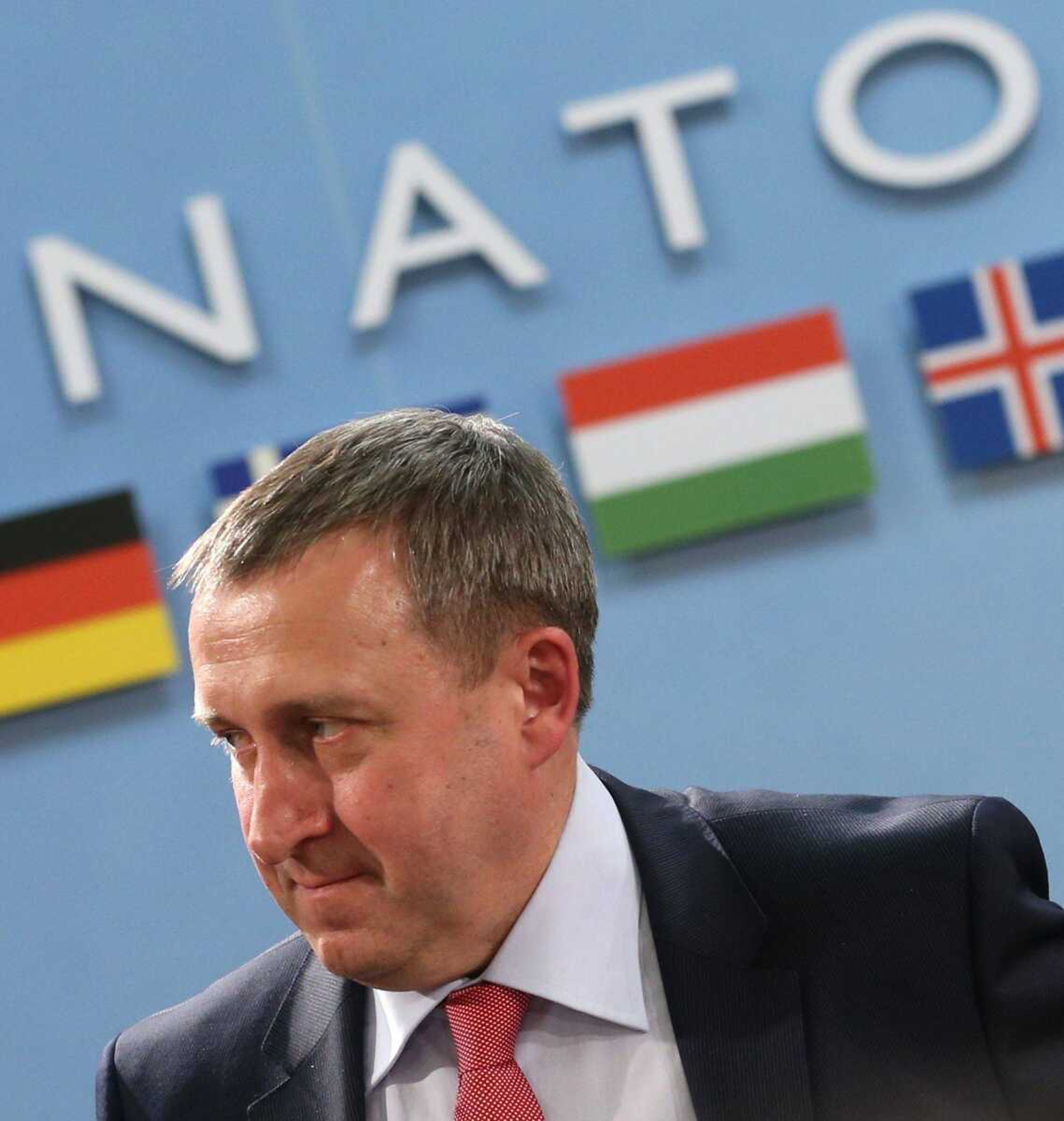 Ukraine foreign minister Andrii Deshchytsia waits for the start of a meeting Tuesday of the NATO-Ukraine Commission at NATO headquarters in Brussels. (Olivier Hoslet ~ Associated Press)