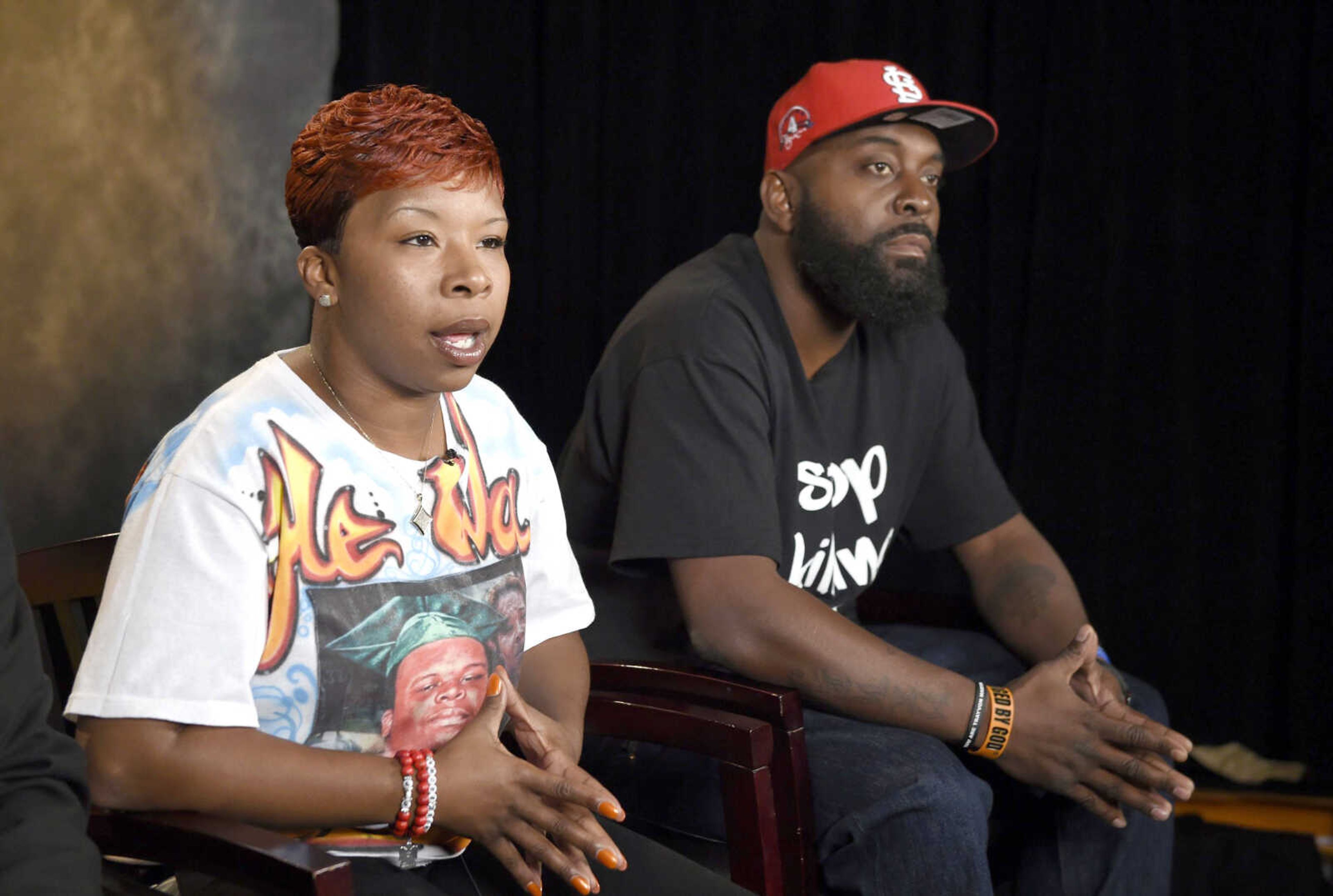 The parents of Michael Brown, Lezley McSpadden, left, and Michael Brown Sr., sit for an interview Sept. 27, 2014, in Washington.