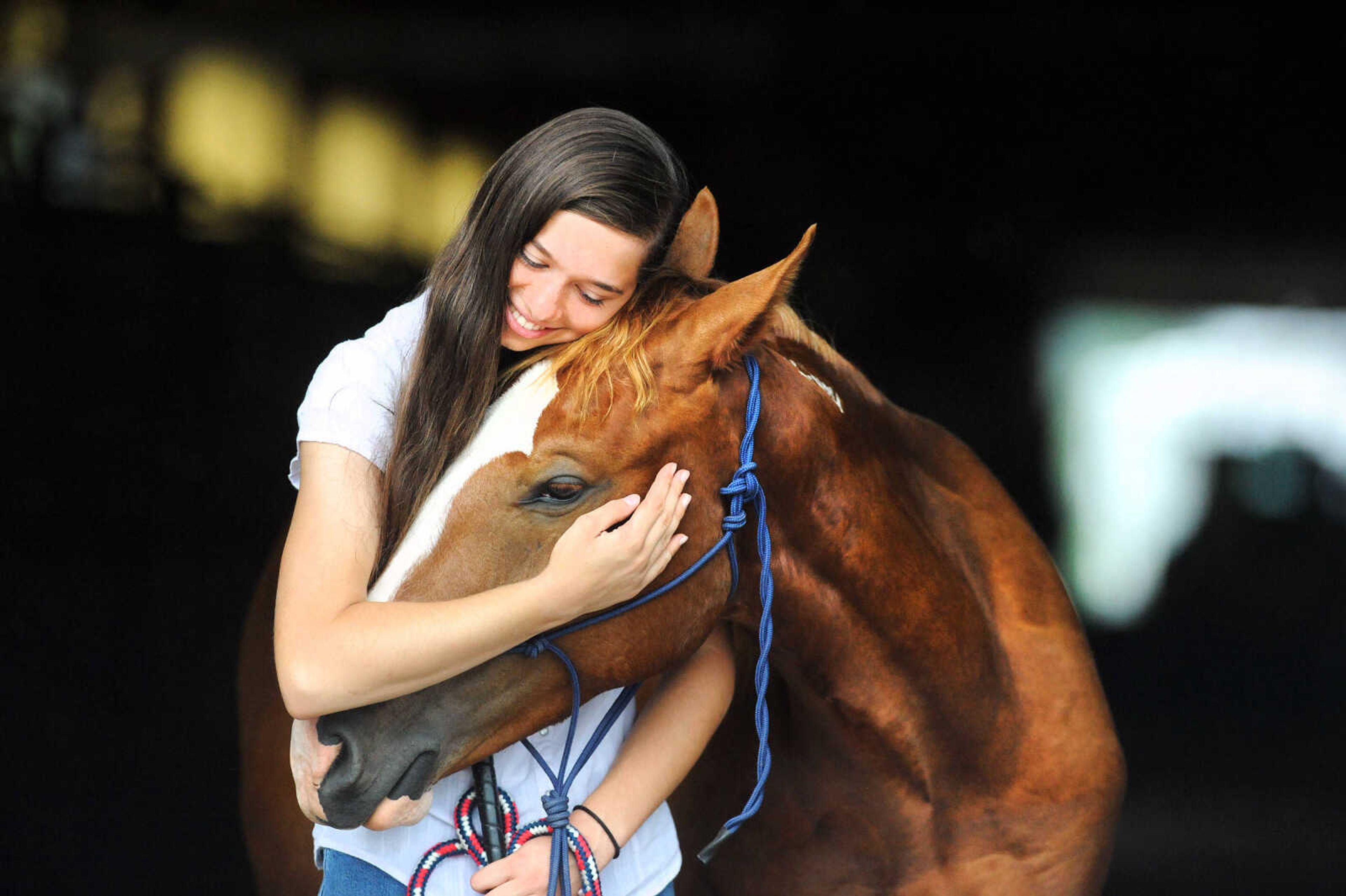 LAURA SIMON ~ lsimon@semissourian.com

Allison Elfrink and her wild mustang, Chico, at Flickerwood Arena in Jackson, Missouri, Wednesday, Aug. 5, 2015.