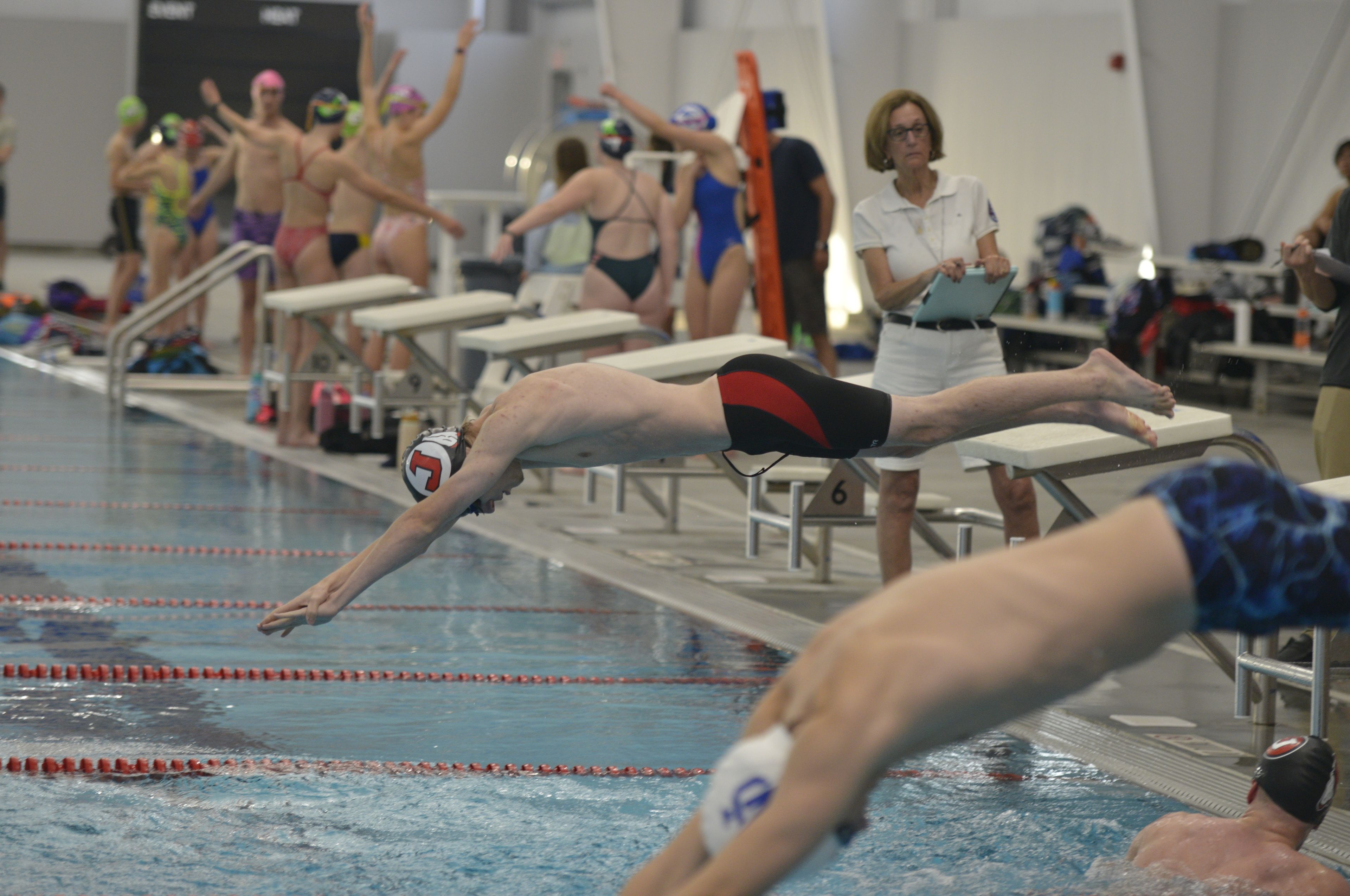 Jackson's Kenyan Kelpe dives during a relay against Notre Dame on Monday, Oct. 28, at the Cape Aquatic Center.