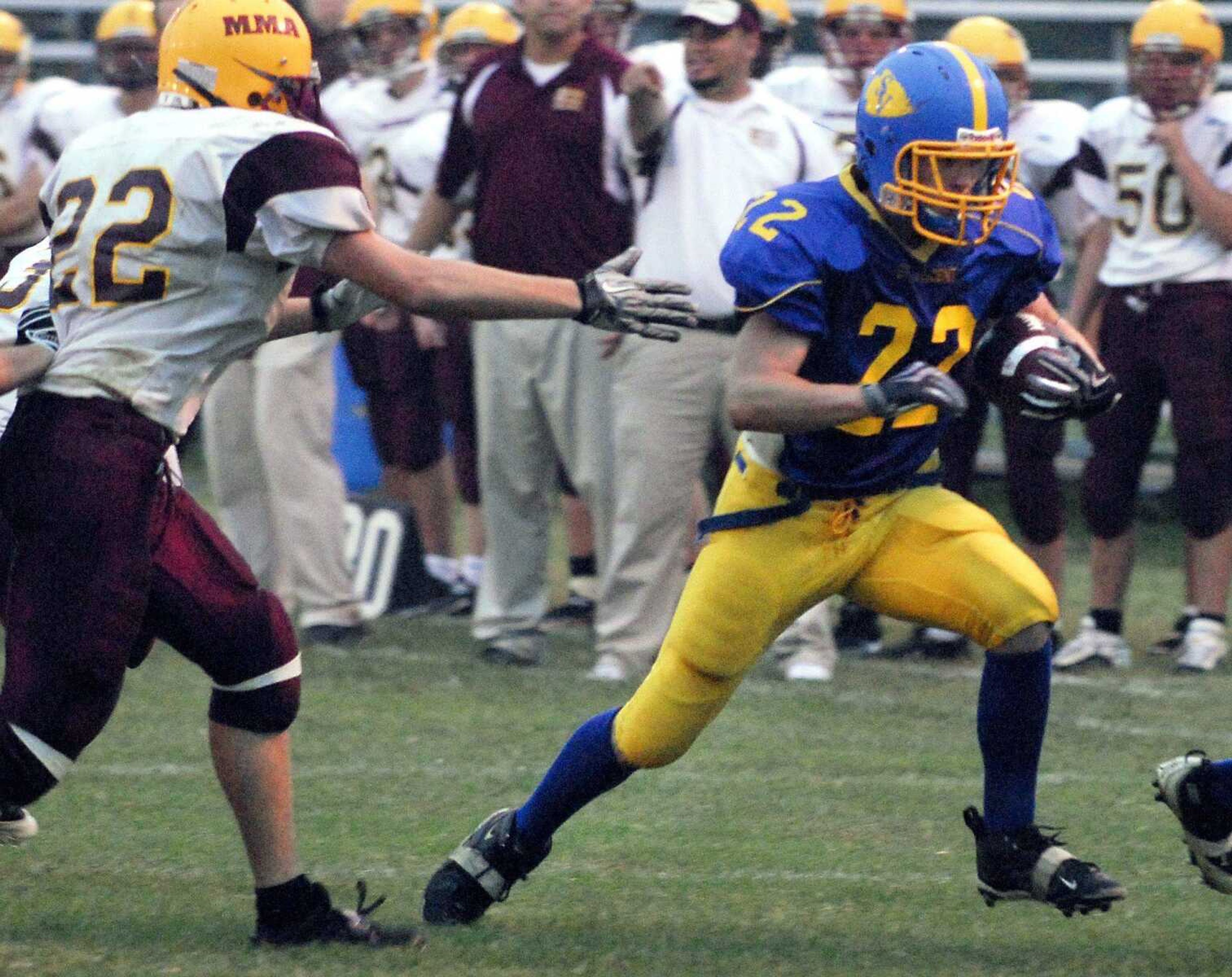 St. Vincent's Ryan Weissing maneuvers past Missouri Military defender Travis Skinner during Friday's game.