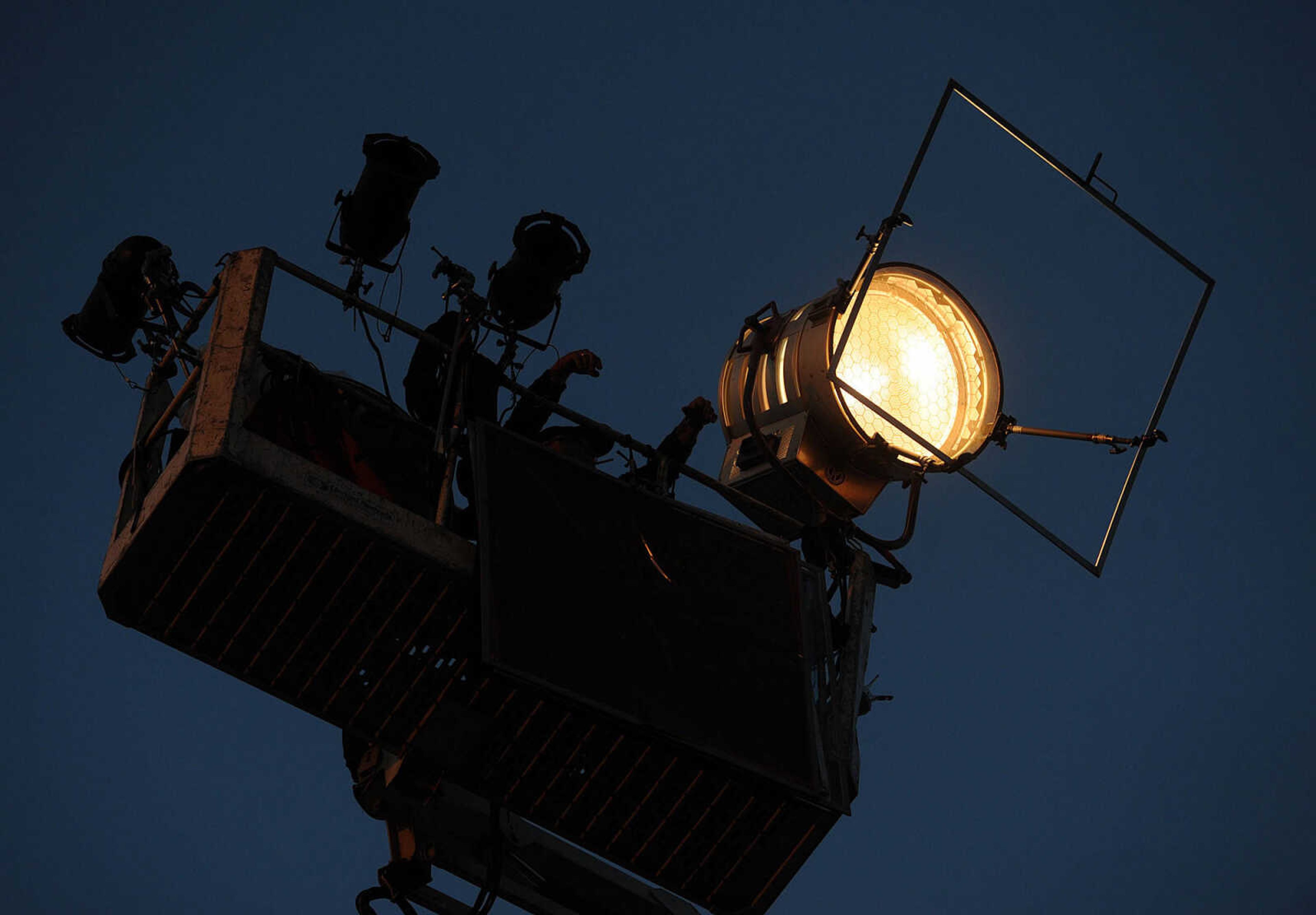 LAURA SIMON ~ lsimon@semissourian.com

Lights for 20th Century Fox's feature film "Gone Girl" are raised up high to illuminate the area around the Common Pleas Courthouse, Thursday, Oct. 3, 2013, in Cape Girardeau.