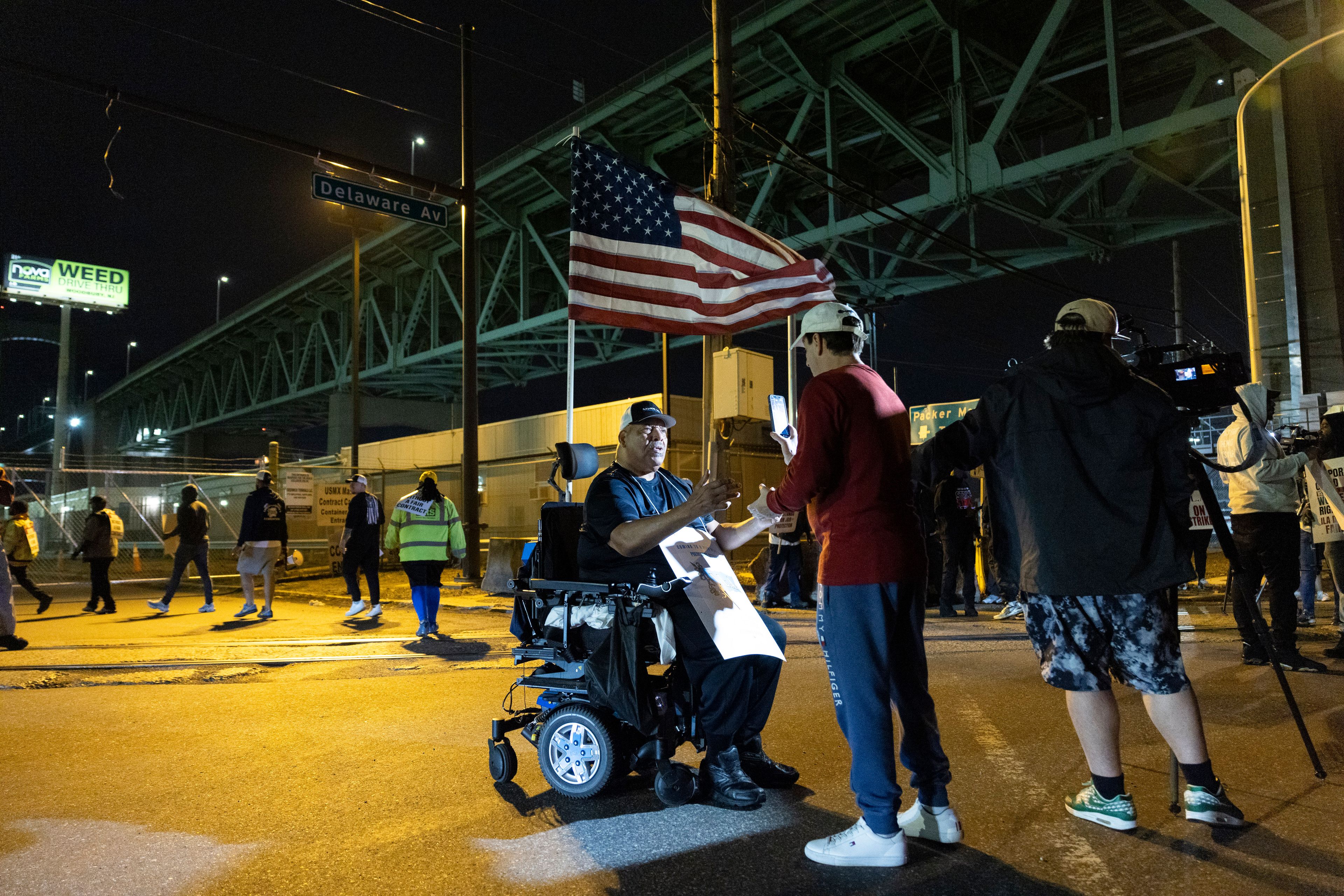 Boise Butler, president of ILA Local 1291, speaks to the press outside the Packer Avenue Marine Terminal Port in Philadelphia, Tuesday, Oct. 1, 2024. (AP Photo/Ryan Collerd)