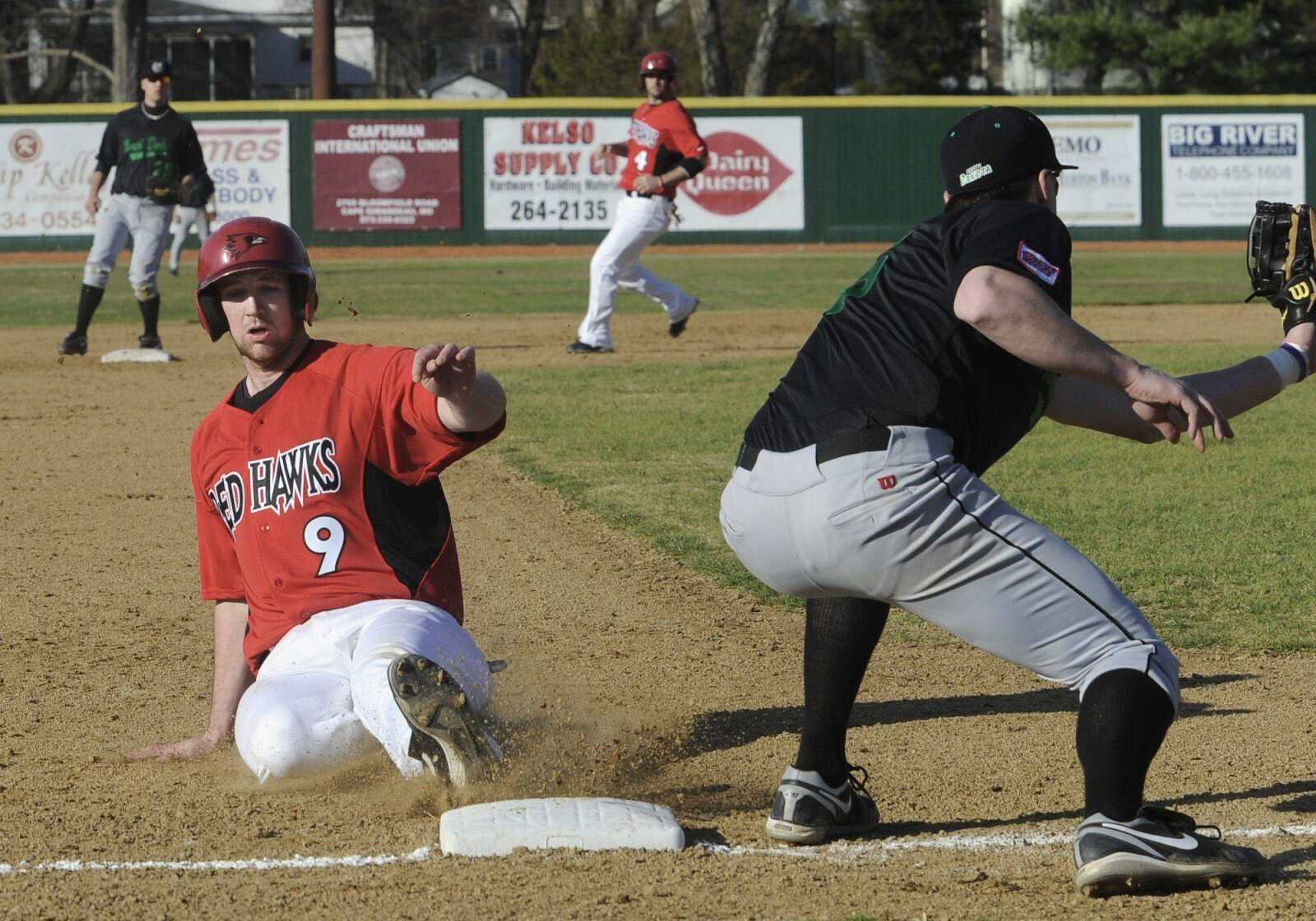 Southeast Missouri State's Trenton Moses steals third base during the fourth inning Friday. Kenton Parmley also advanced to second base.