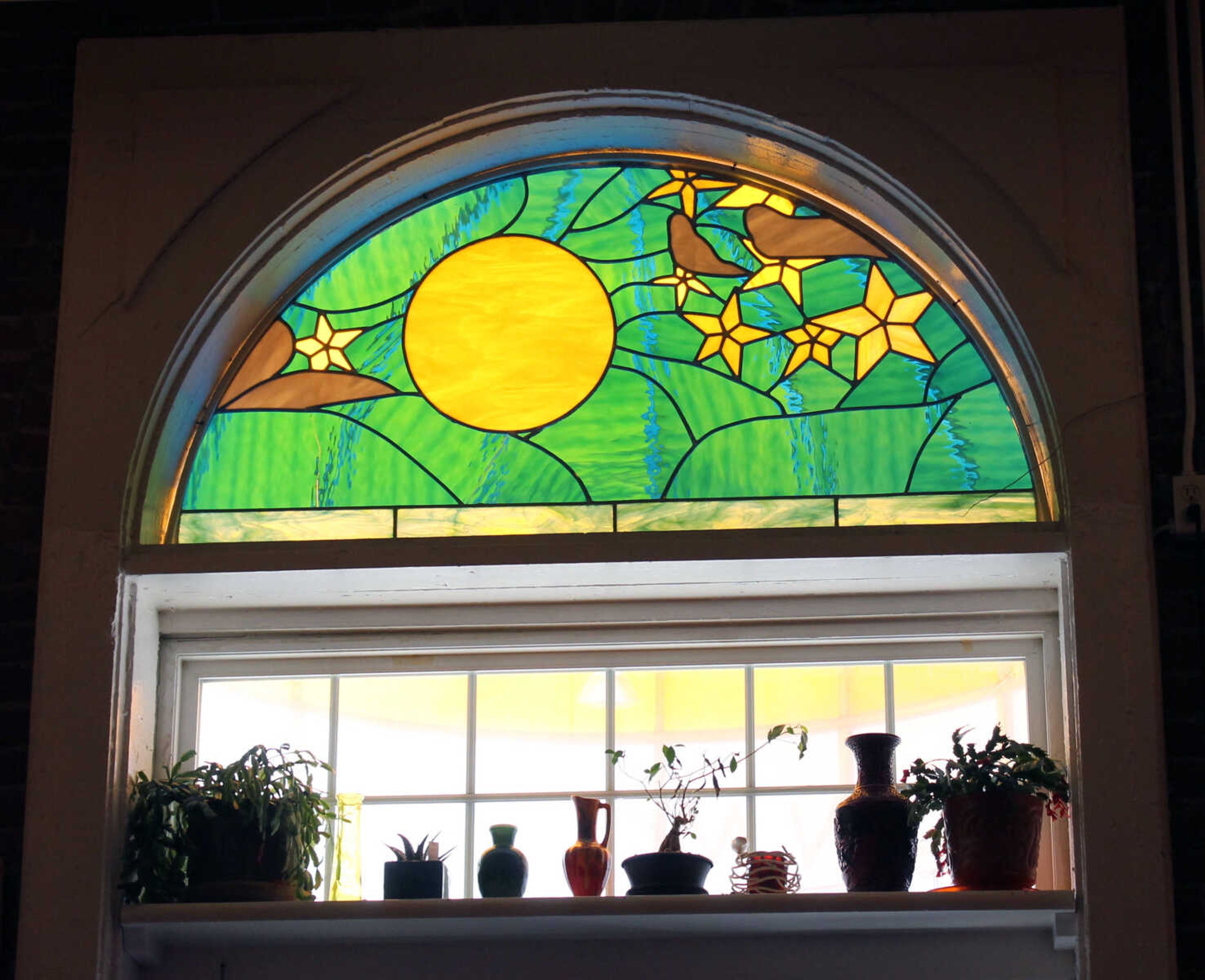 Emily Priddy ~ epriddy@semissourian.com
Sunlight passes through a stained-glass window featuring the eponymous yellow moon Friday, March 10, 2017, at Yellow Moon Cafe in Cobden, Illinois.