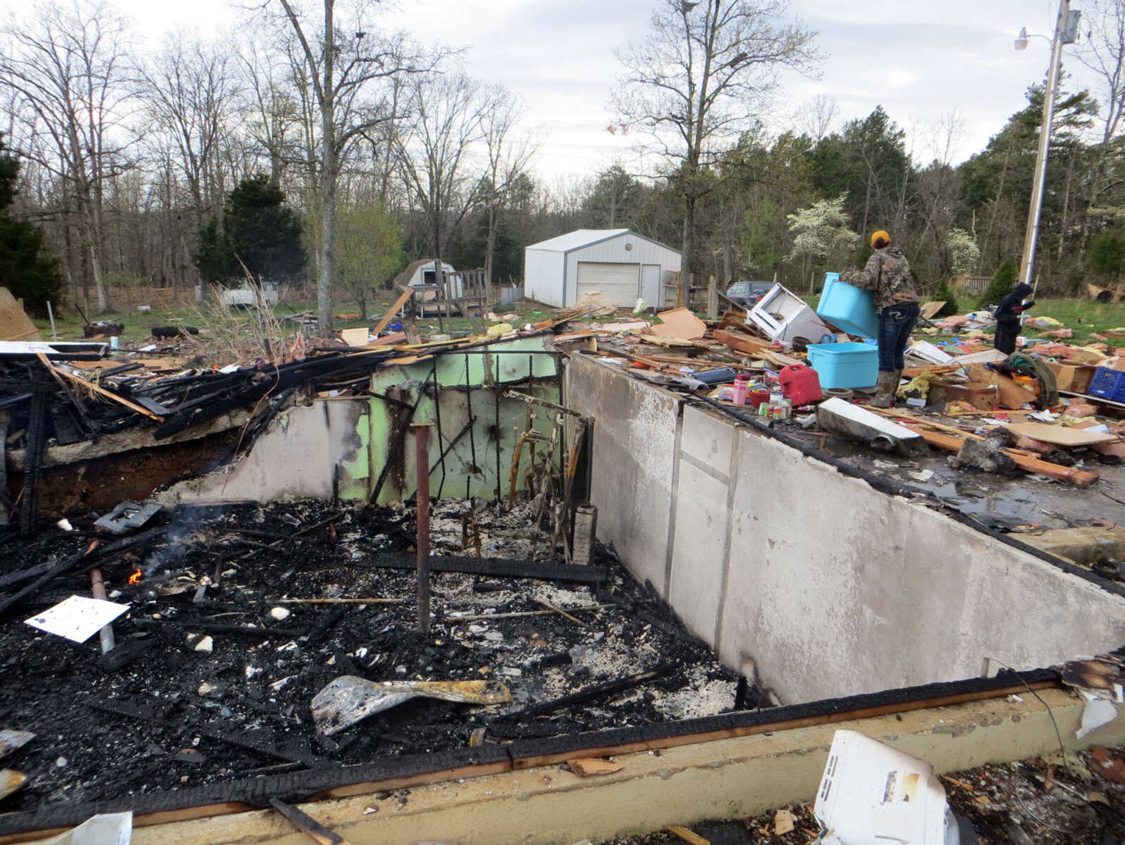 The home of Isaac Wittenborn is seen Sunday, April 10, 2016 after an explosion destroyed the home Saturday night. (Tyler Graef)