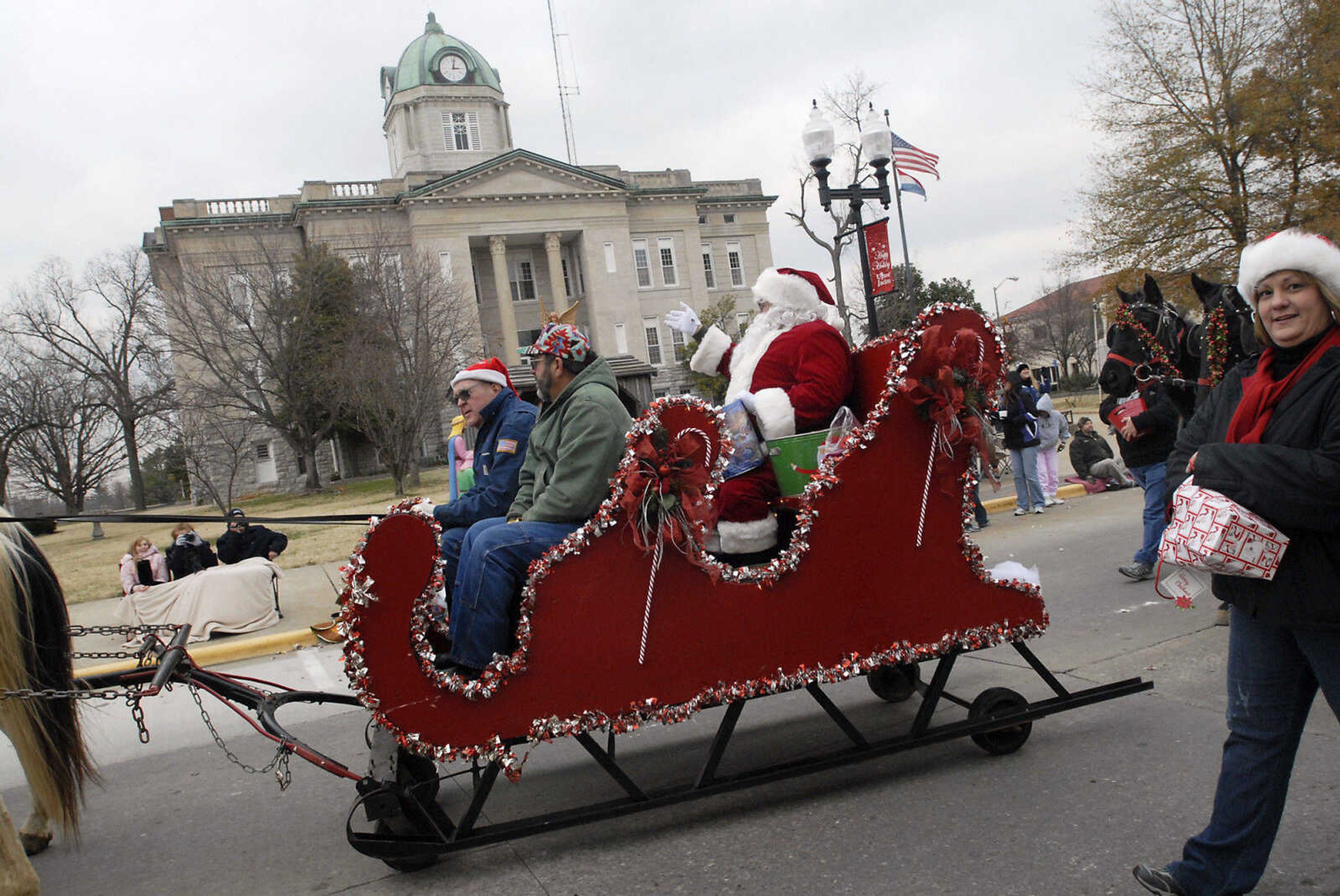 KRISTIN EBERTS ~ keberts@semissourian.com

Santa passes the courthouse during the Jackson Christmas Parade on Saturday, Dec. 4, 2010, in downtown Jackson.