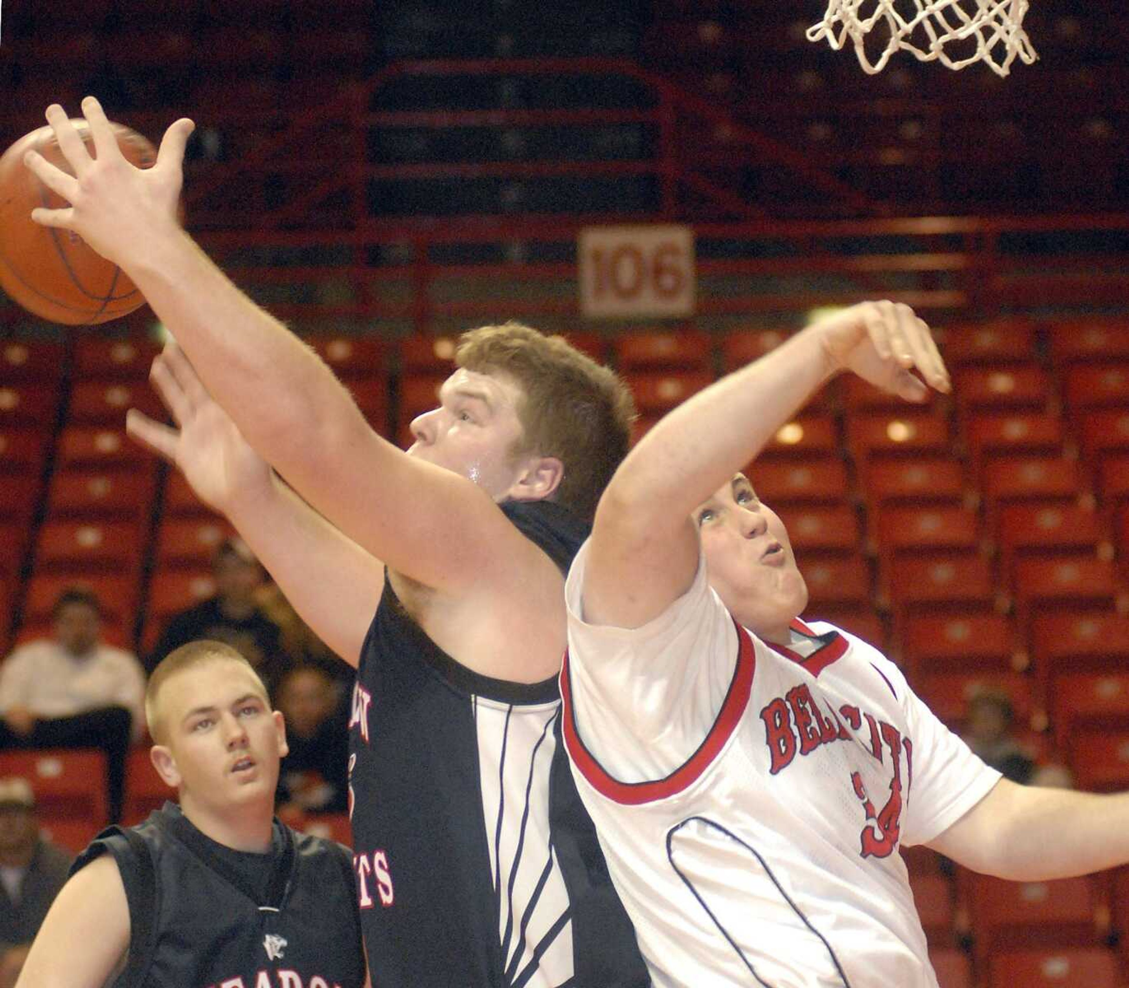 Meadow Heights' Tyler Wagner grabbed a rebound away from Bell City's Clay Dover at last year's Southeast Missourian Christmas Tournament. (AARON EISENHAUER ~ photos@semissourian.com)