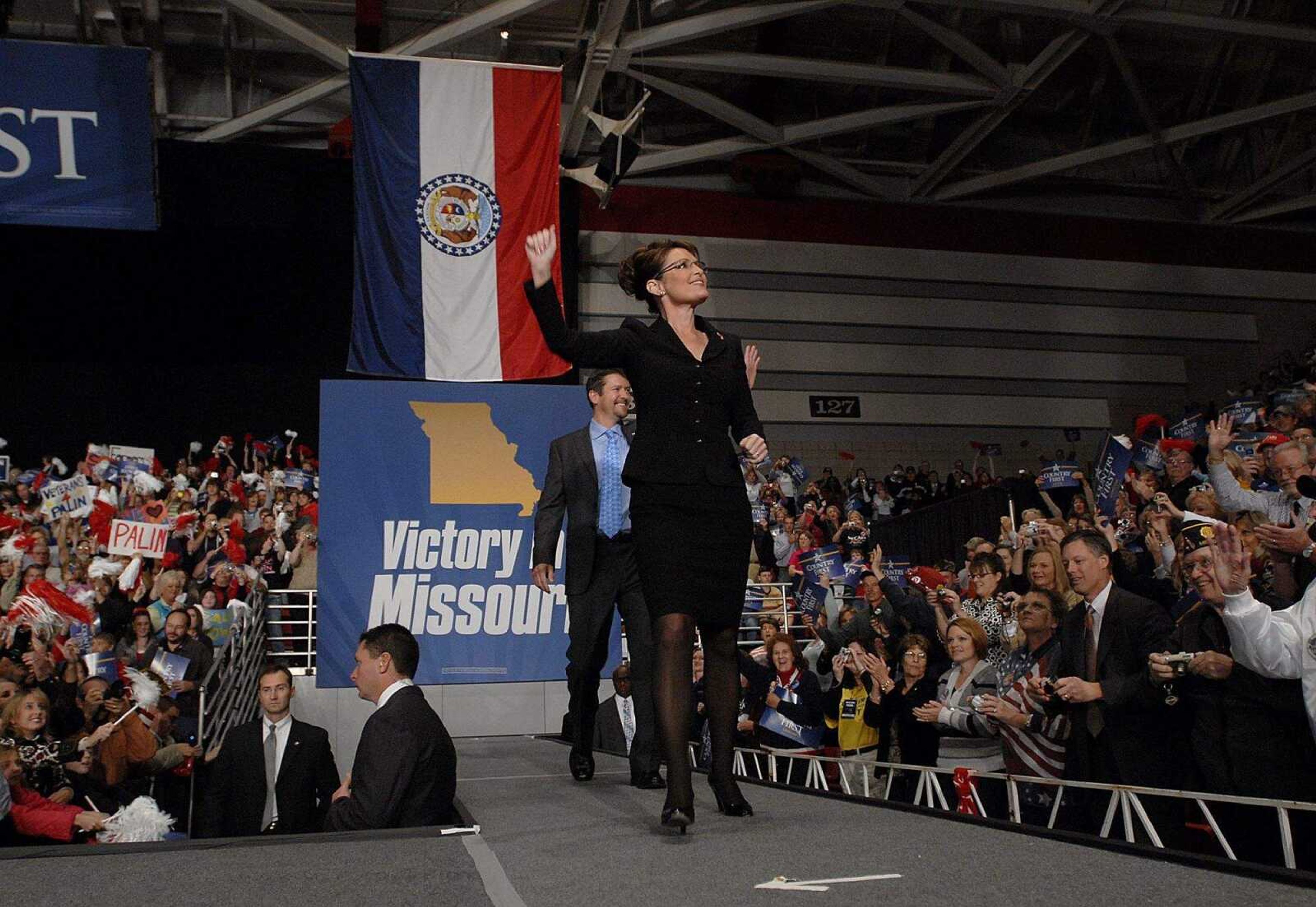 AARON EISENHAUER ~ aeisenhauer@semissourian.com
Sarah Palin, with husband Todd Palin, makes her way to the stage.