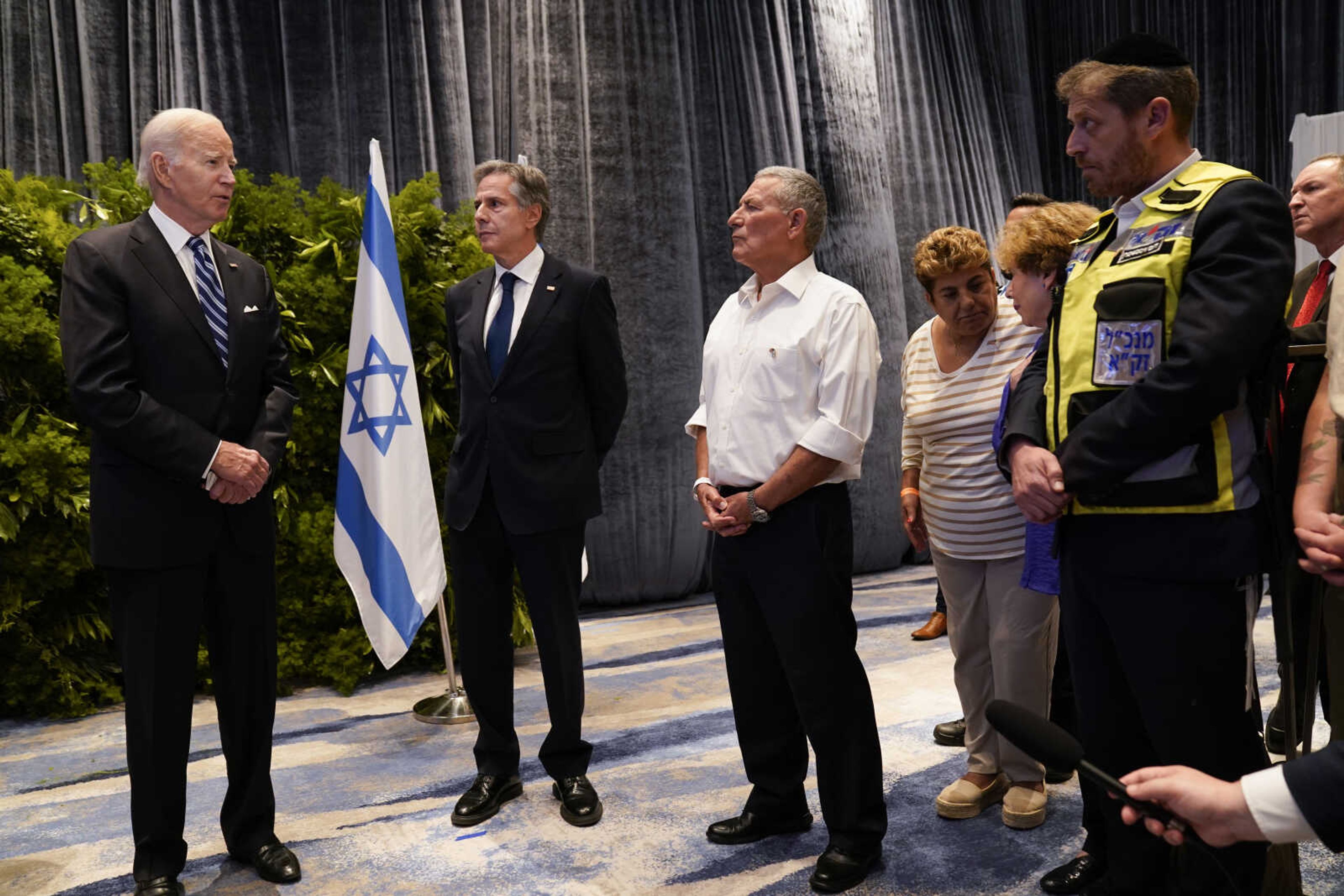 President Joe Biden and U.S. Secretary of State Antony Blinken meet with victims' relatives and first responders who were directly affected by the Hamas attacks, Wednesday in Tel Aviv.