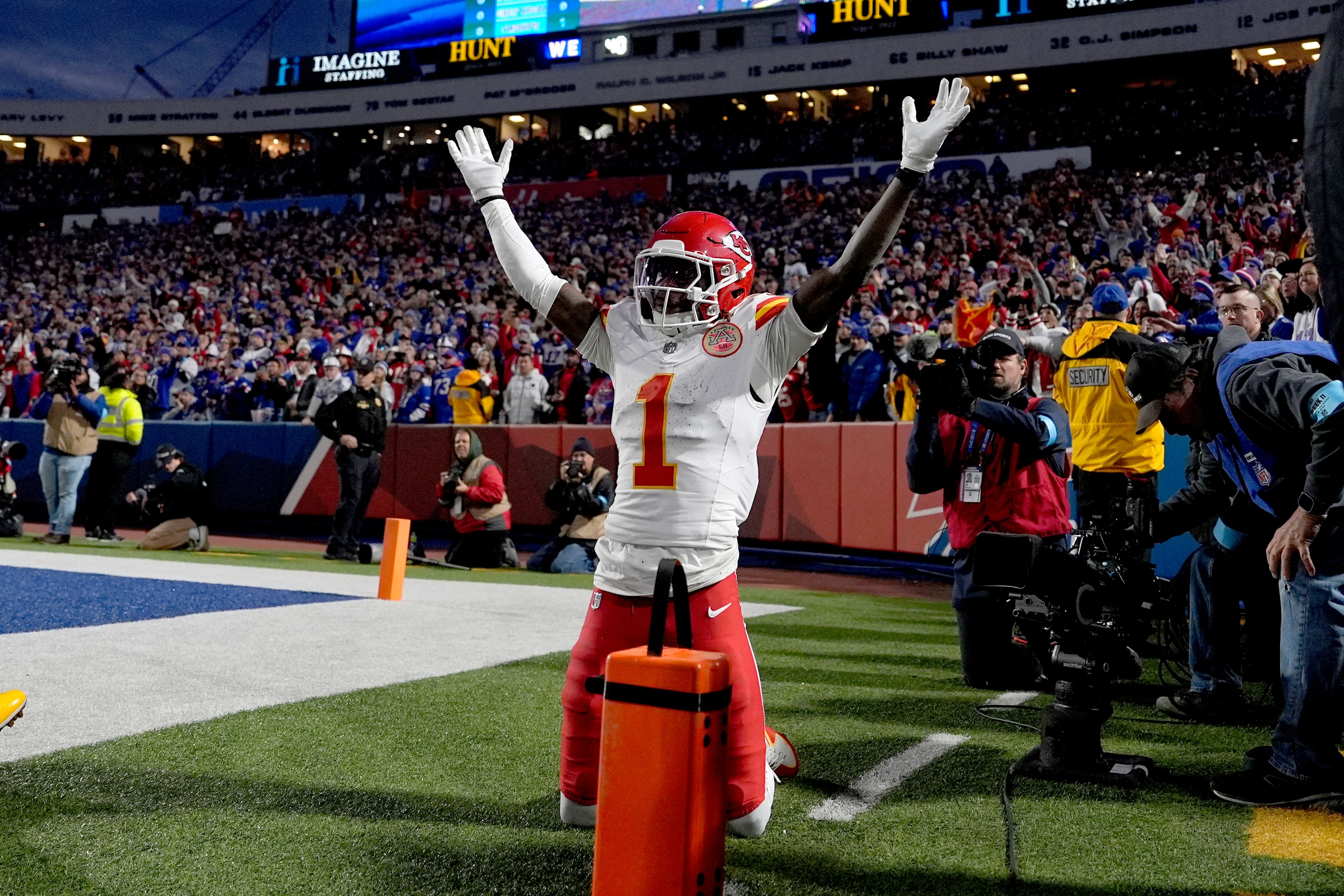 Kansas City Chiefs wide receiver Xavier Worthy (1) celebrates after scoring during the first half of an NFL football game against the Buffalo Bills Sunday, Nov. 17, 2024, in Orchard Park, N.Y. (AP Photo/Julia Demaree Nikhinson)