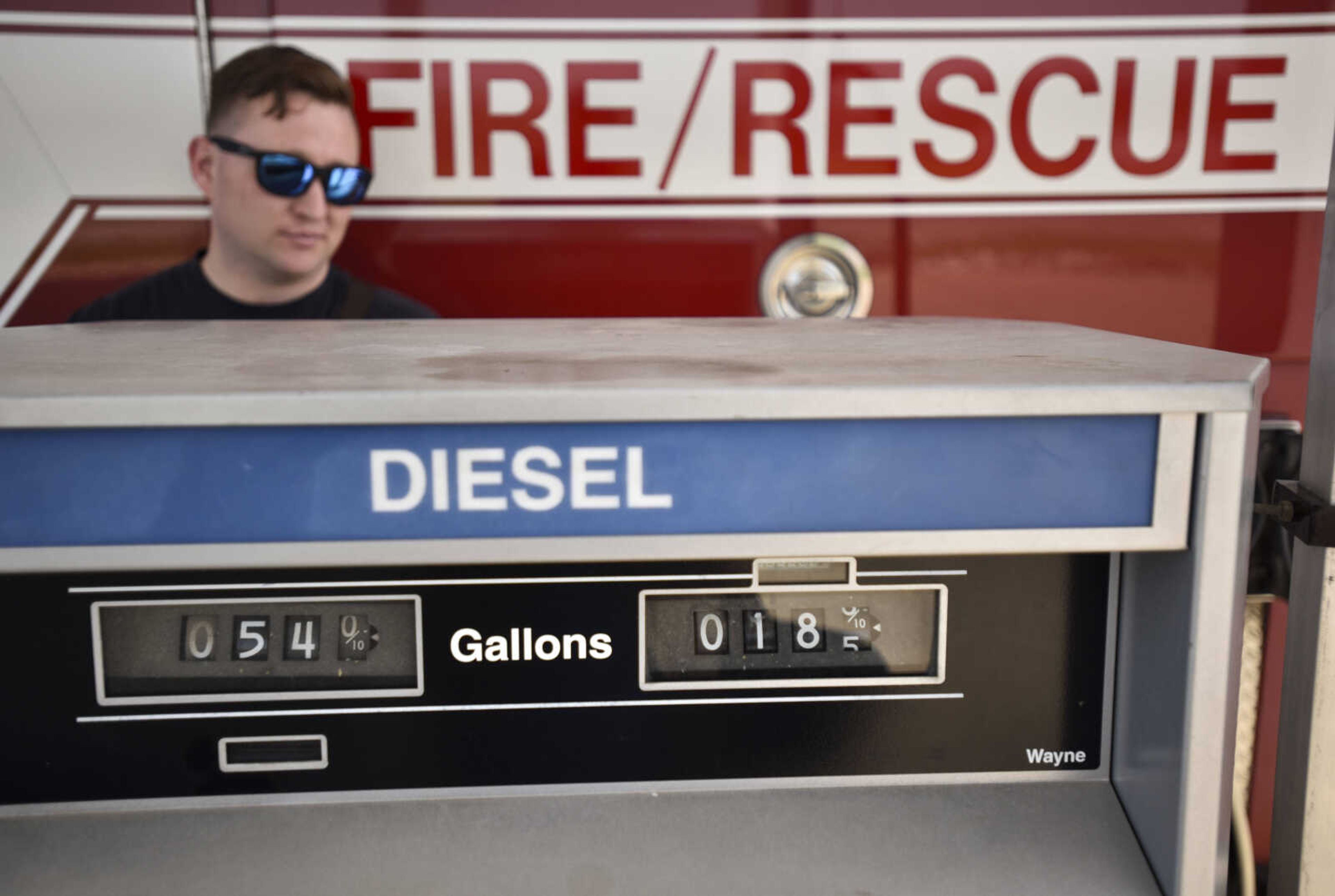 Cape Girardeau firefighter David Uptmor pumps fuel into a firetruck Tuesday, April 17, 2018, in Cape Girardeau.