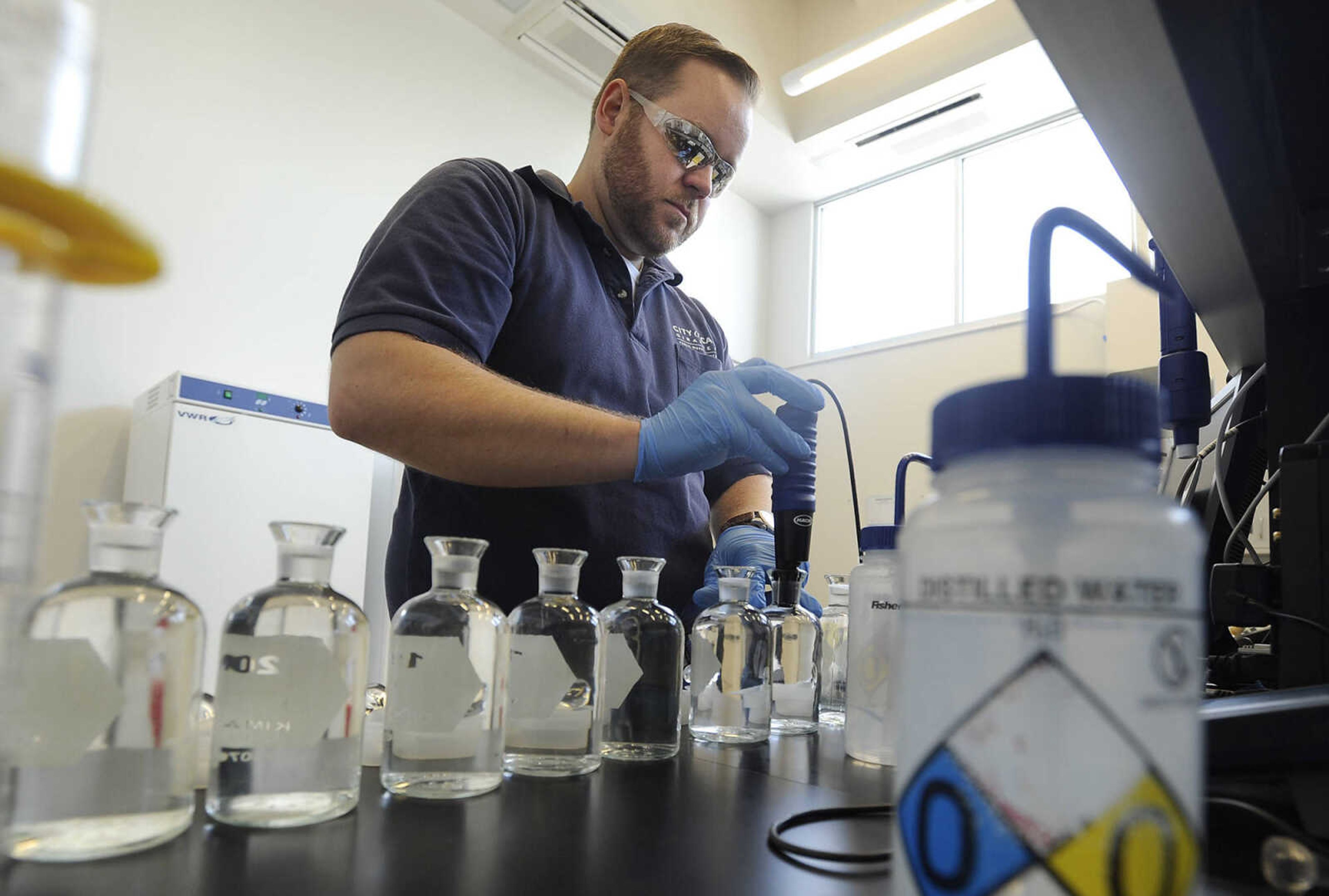 FRED LYNCH ~ flynch@semissourian.com
Andrew Maurer, wastewater pre-treatment coordinator, does a biochemical oxygen demand test Monday, May 23, 2016 at the new wastewater treatment plant in Cape Girardeau.