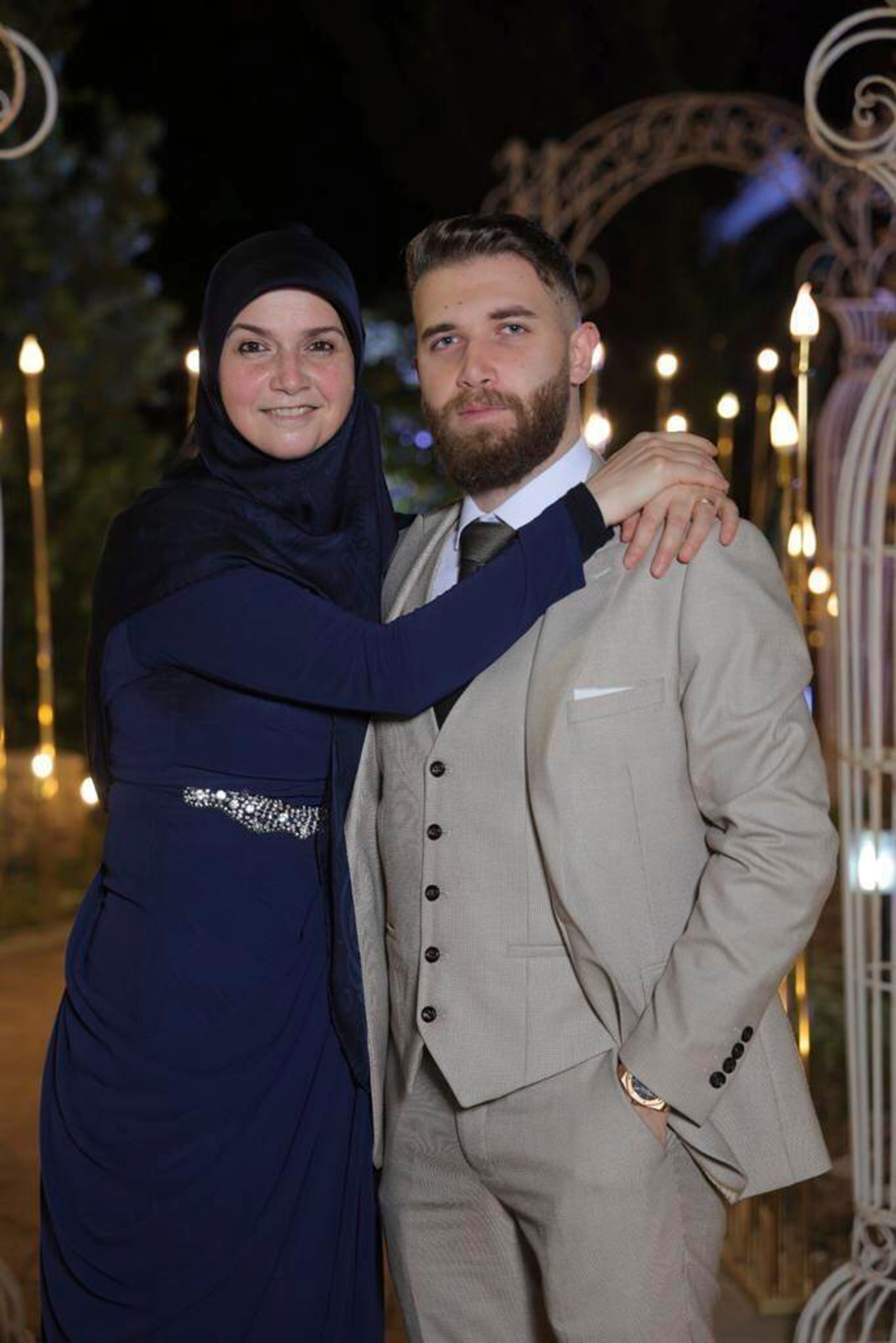 This June 2023 photo provided by Reda Gharib, shows Reda Gharib, right, and his mother, Hanan, who was killed with other family members in an Israeli airstrike on the family's apartment in al-Housh, in the southern Lebanese city of Tyre on Sept. 23, at the start of an escalation in its war against Hezbollah. (Reda Gharib via AP)