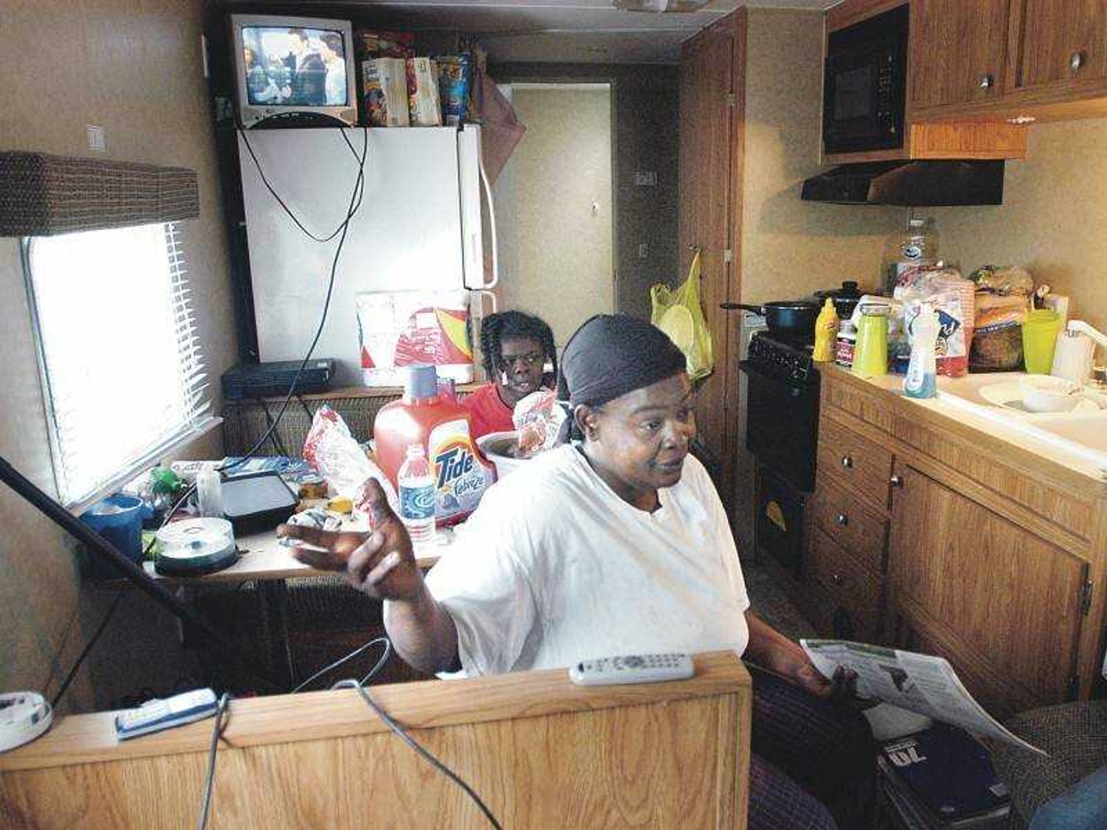 Polly Foreman, her two children and her handicapped cousin live in a one-bedroom camper she received from FEMA after her home was destroyed more than five months ago in the Caruthersville tornado. Her next-door neighbor lives alone in a three-bedroom trailer. (Diane L. Wilson)