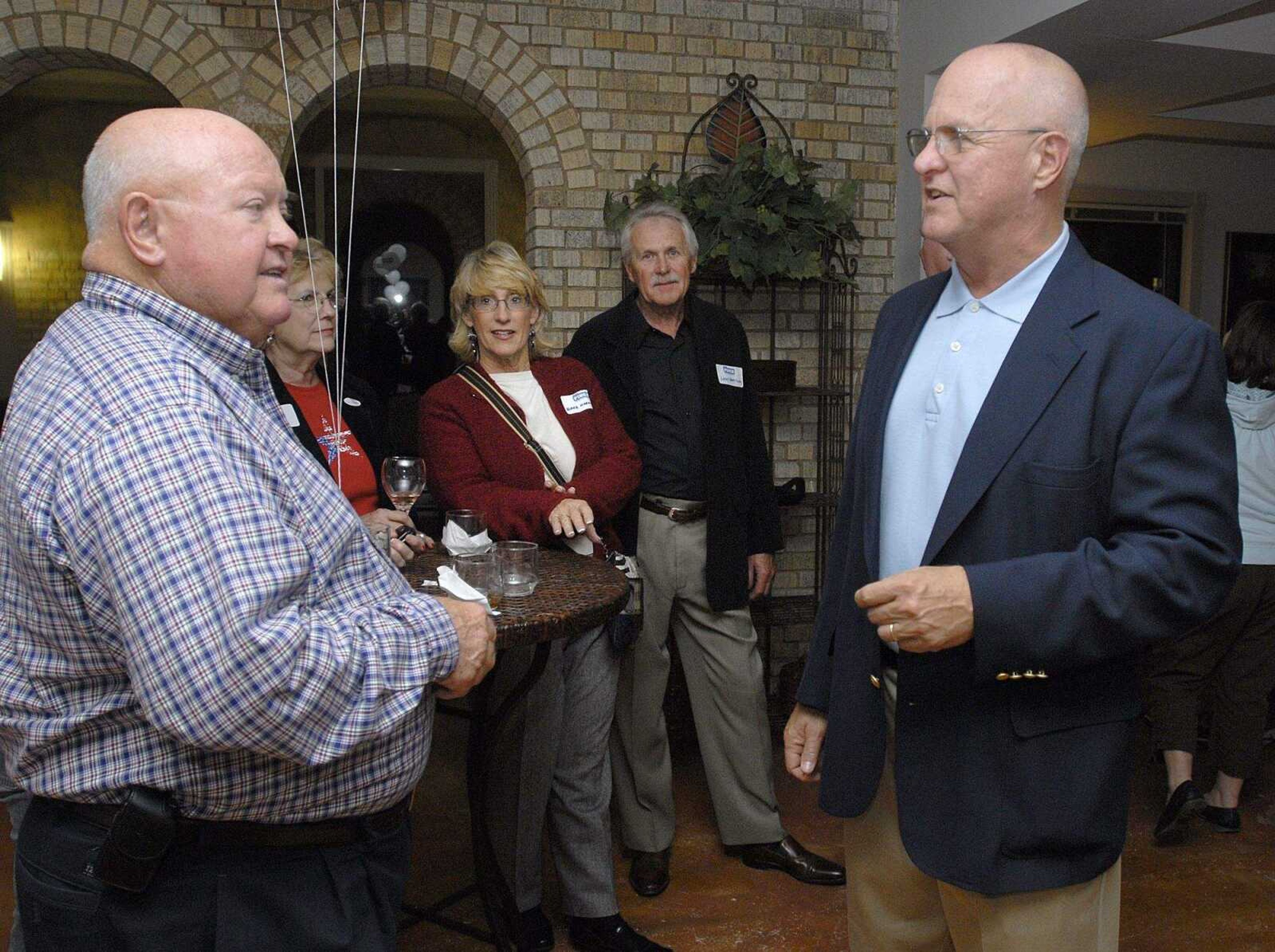 FRED LYNCH ~ flynch@semissourian.com
Rock Finch, right, talks with Cape Girardeau County Presiding Commissioner Gerald Jones as the final vote tally came in for the District 2 commissioner race Tuesday night. Finch lost to incumbent Jay Purcell.