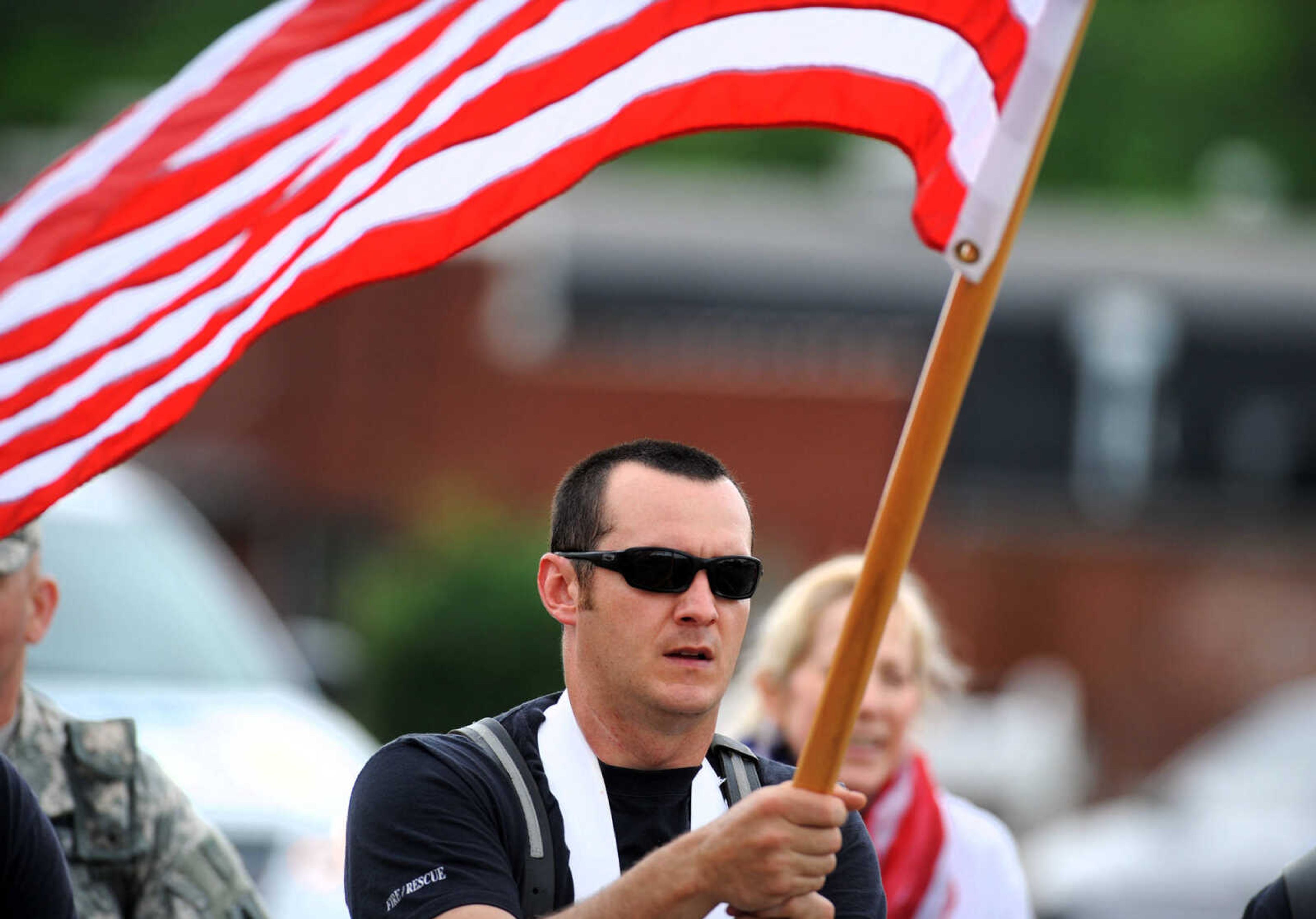 LAURA SIMON ~ lsimon@semissourian.com

Participants walk north along Kingshighway during the first ever Carry the Load event, Monday, May 25, 2015, in Cape Girardeau.