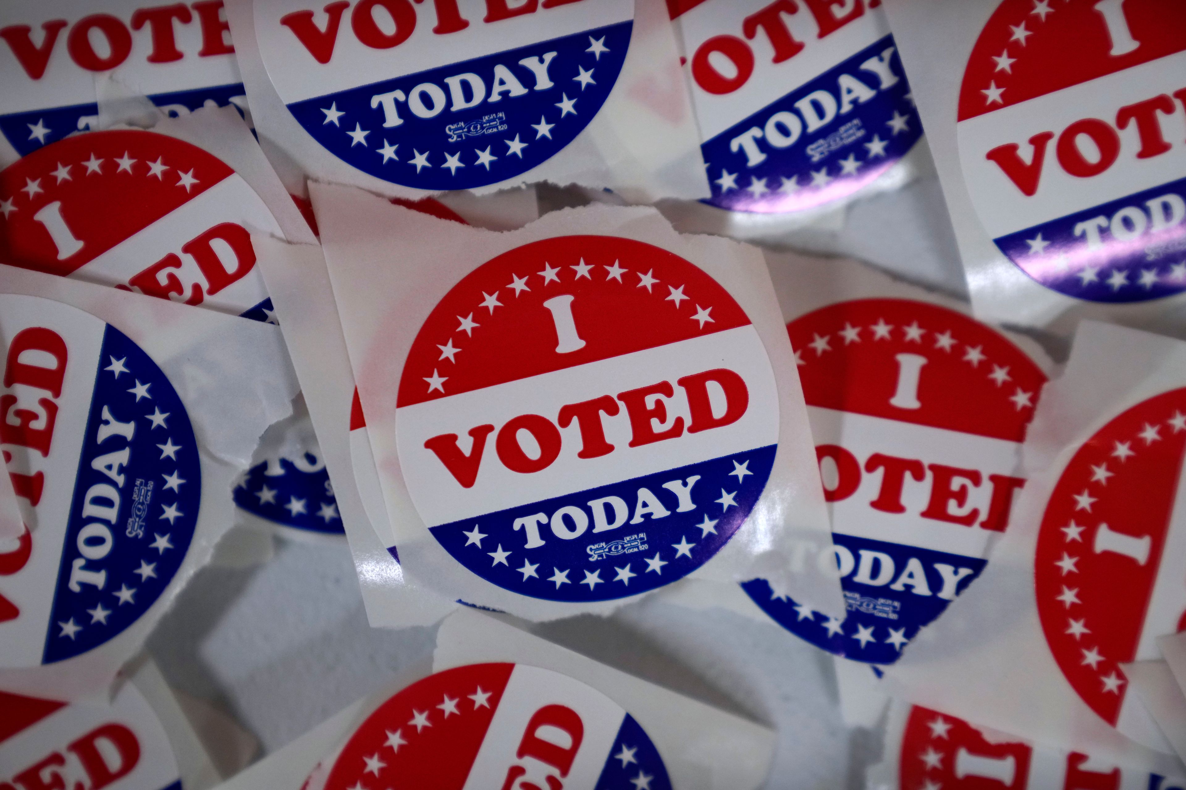 "I voted" stickers are seen in the Polk County Election Office during early voting, Wednesday, Oct. 16, 2024, in Des Moines, Iowa. (AP Photo/Charlie Neibergall)