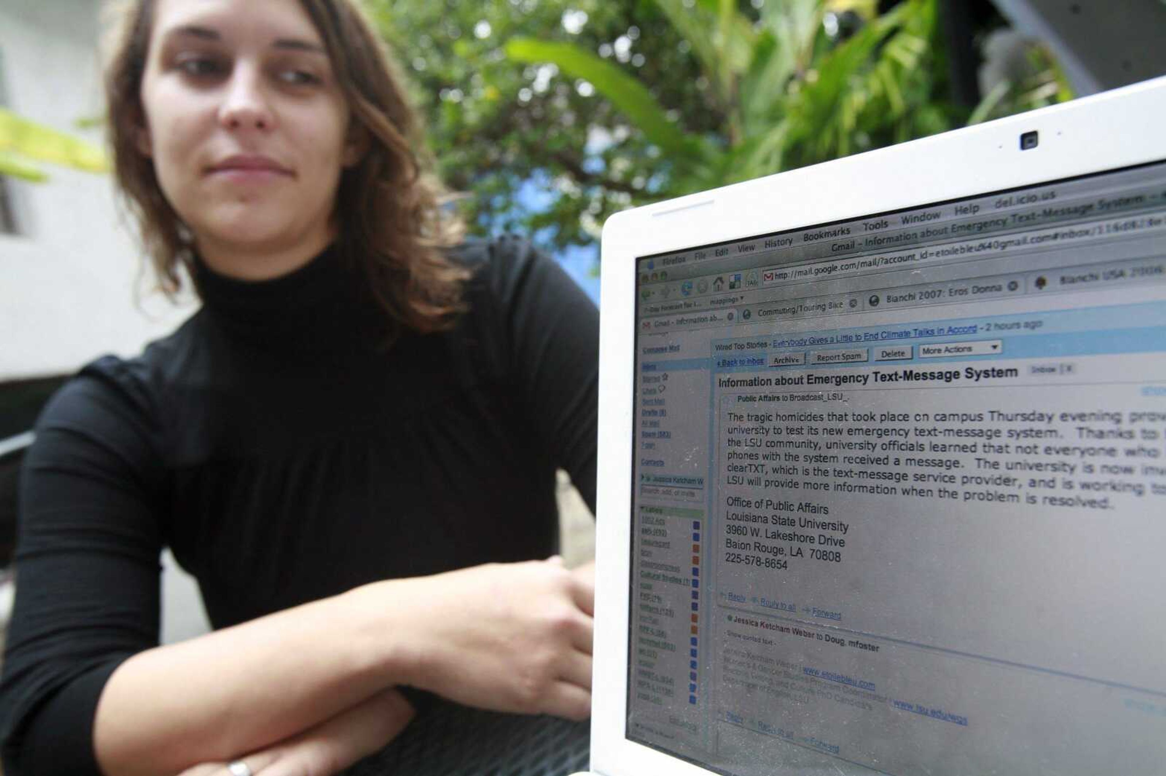 Louisiana State University graduate student Jessica Ketcham Weber, 25, showed the broadcast e-mail she received early Friday morning at LSU in Baton Rouge, La. The e-mail alerted students to the problems with the University's Emergency Text-Messaging System. (Tim Mueller ~ Associated Press)