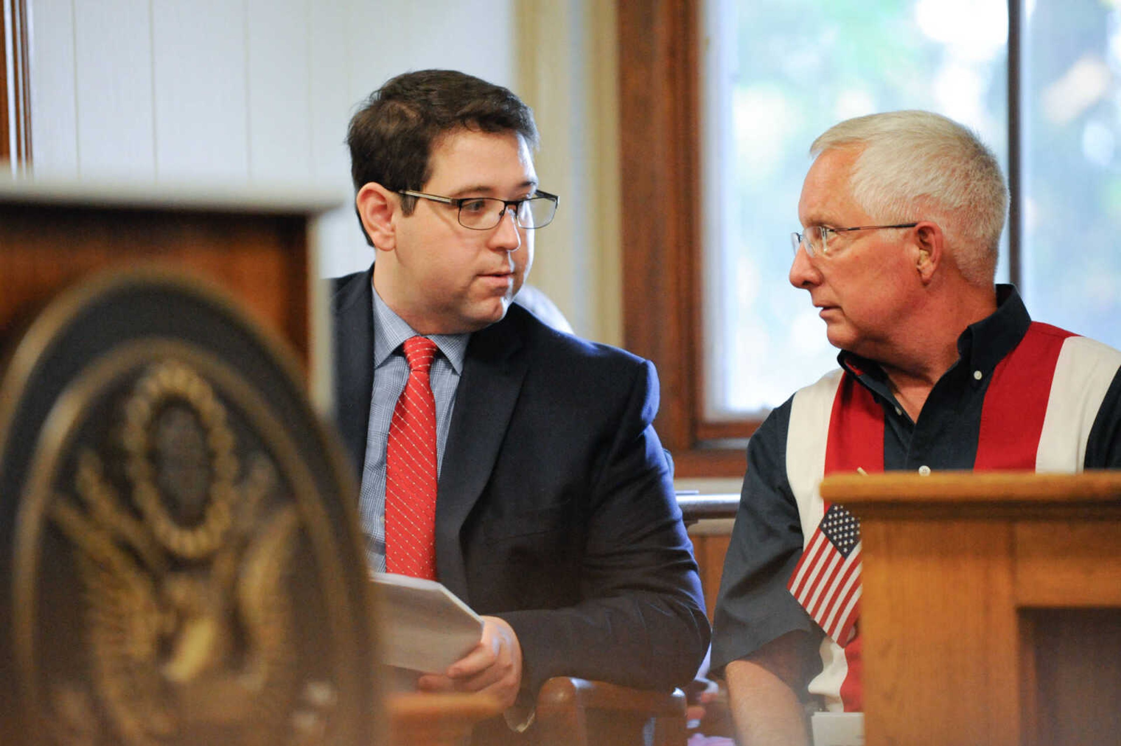 GLENN LANDBERG ~ glandberg@semissourian.com

James D. Bollinger, right, the 2016 Spirit of America award winner talks with Lucas Presson, general manager of rustmedia, before the award ceremony Monday, July 4, 2016 at the Common Pleas Courthouse in Cape Girardeau.