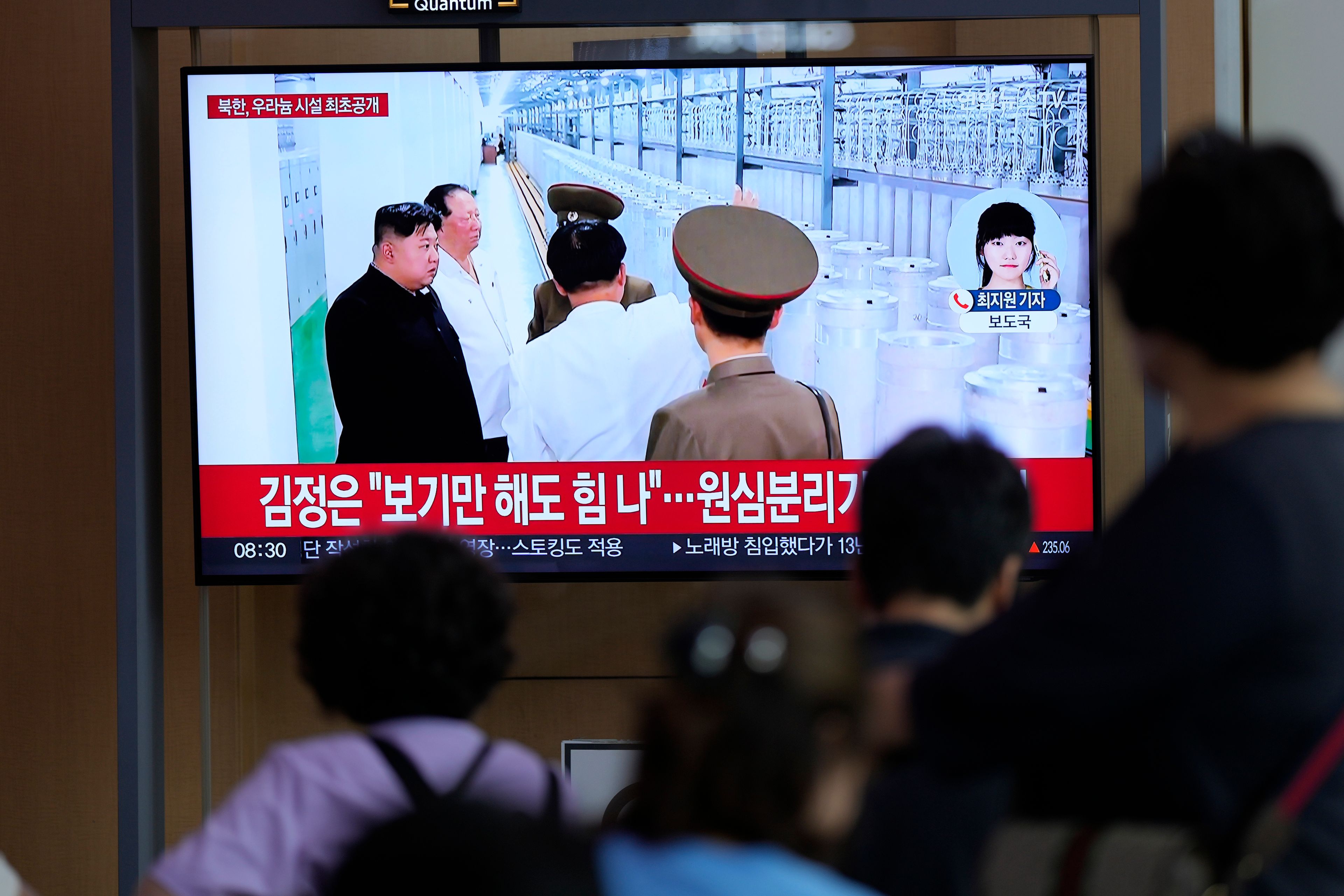 A TV screen shows an image of North Korean leader Kim Jong Un during a news program at the Seoul Railway Station in Seoul, South Korea, Friday, Sept. 13, 2024. The letters on the top read "North Korea, unveiling the uranium enrichment facility for the first time." (AP Photo/Lee Jin-man)