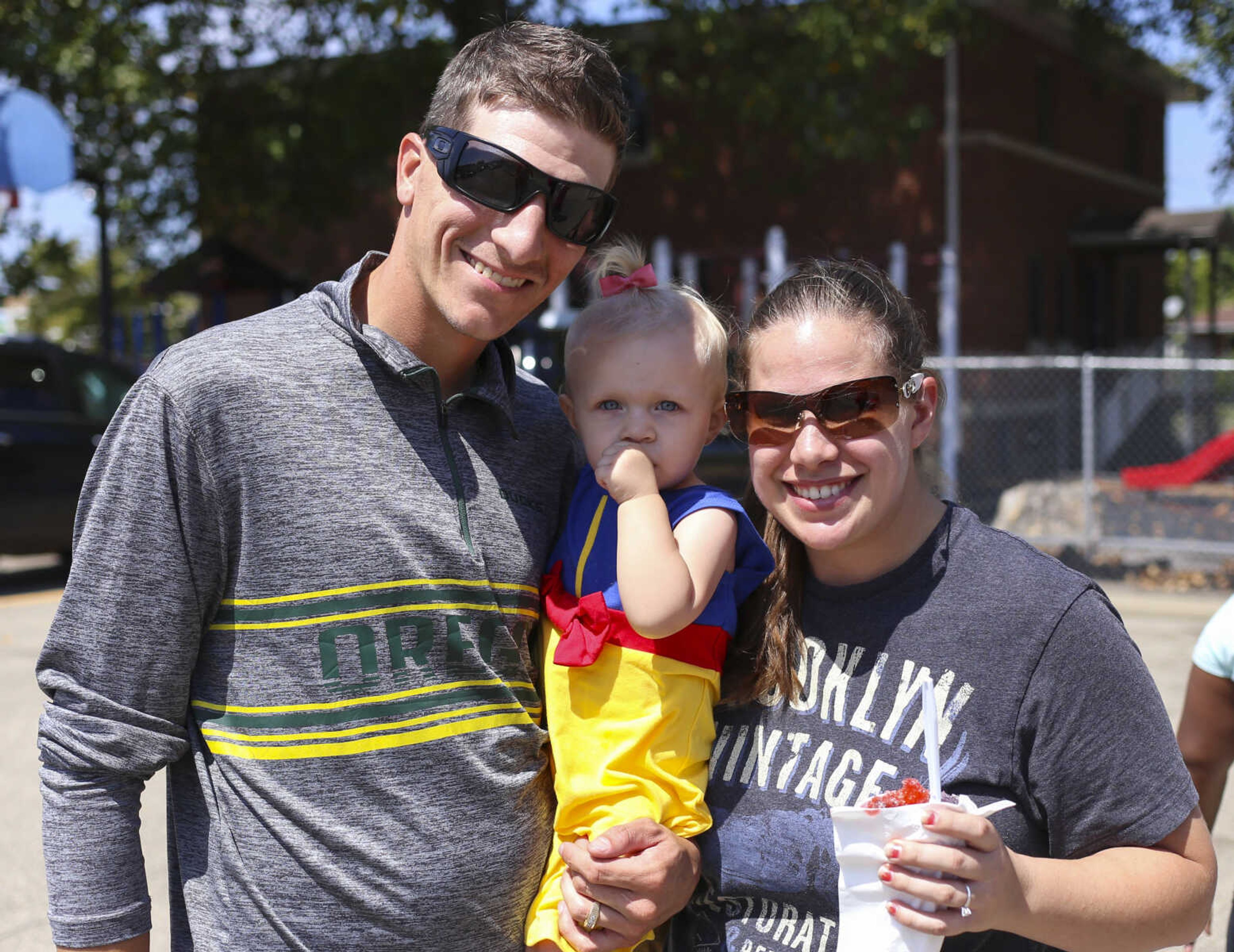 From left, Shawn Owens, Abigail Owens and Jennifer Laurentius pose for a photo at the St. Mary Cathedral parish picnic on Sunday, August 27, 2017, in Cape Girardeau.