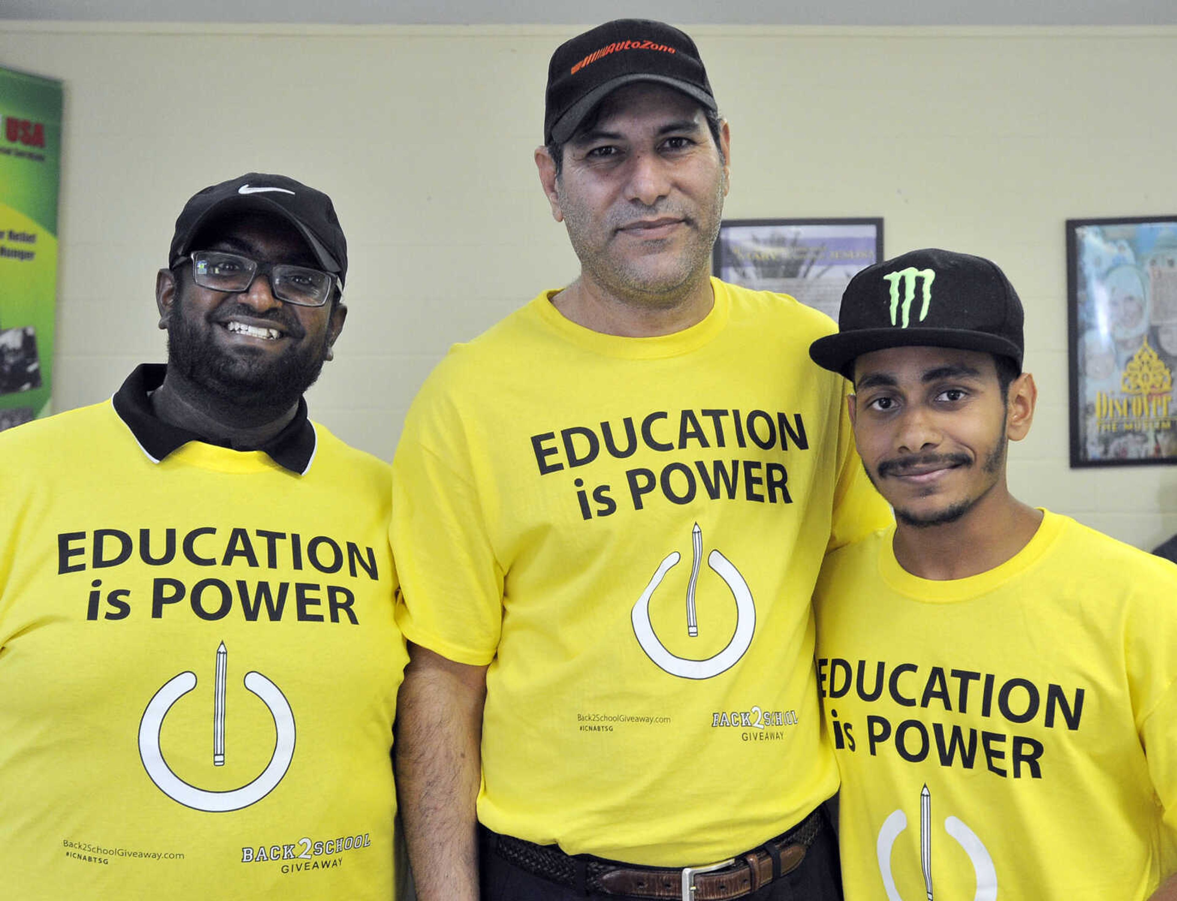 FRED LYNCH ~ flynch@semissourian.com
Bassem Aljizani, left, Ijaz Ahmad and Hamza Ahmed pose for a photo Friday, Aug. 4, 2017 during distribution of backpacks with school supplies at the Islamic Center of Cape Girardeau.