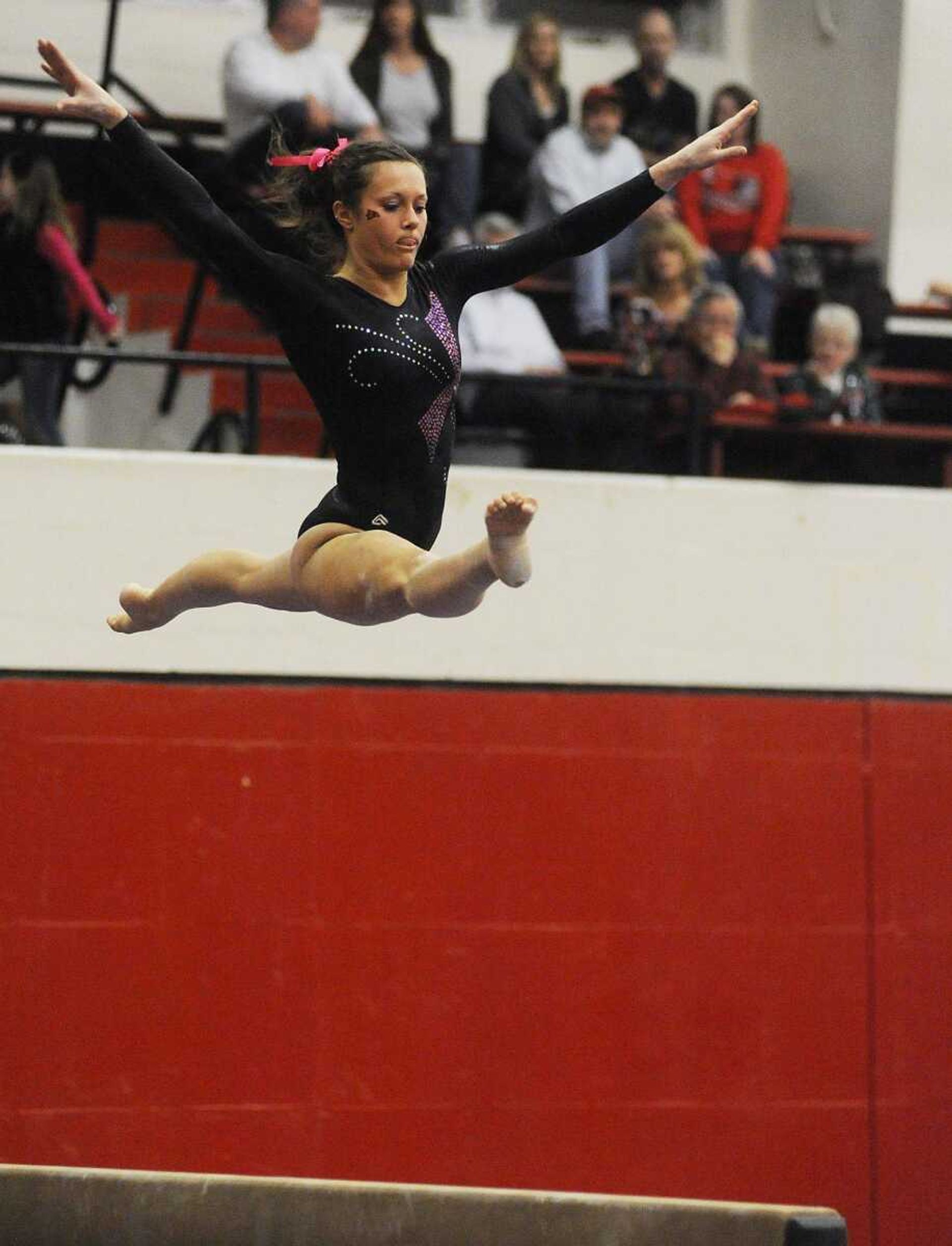 Southeast gymnast Taryn Vanderpool has overcome two years of nagging injuries to qualify for the NCAA South Central Regional, which begins Saturday in Norman, Okla. (Below) Vanderpool, a junior who ranks second in the region in the all-around, competes on the balance beam. (ADAM VOGLER)