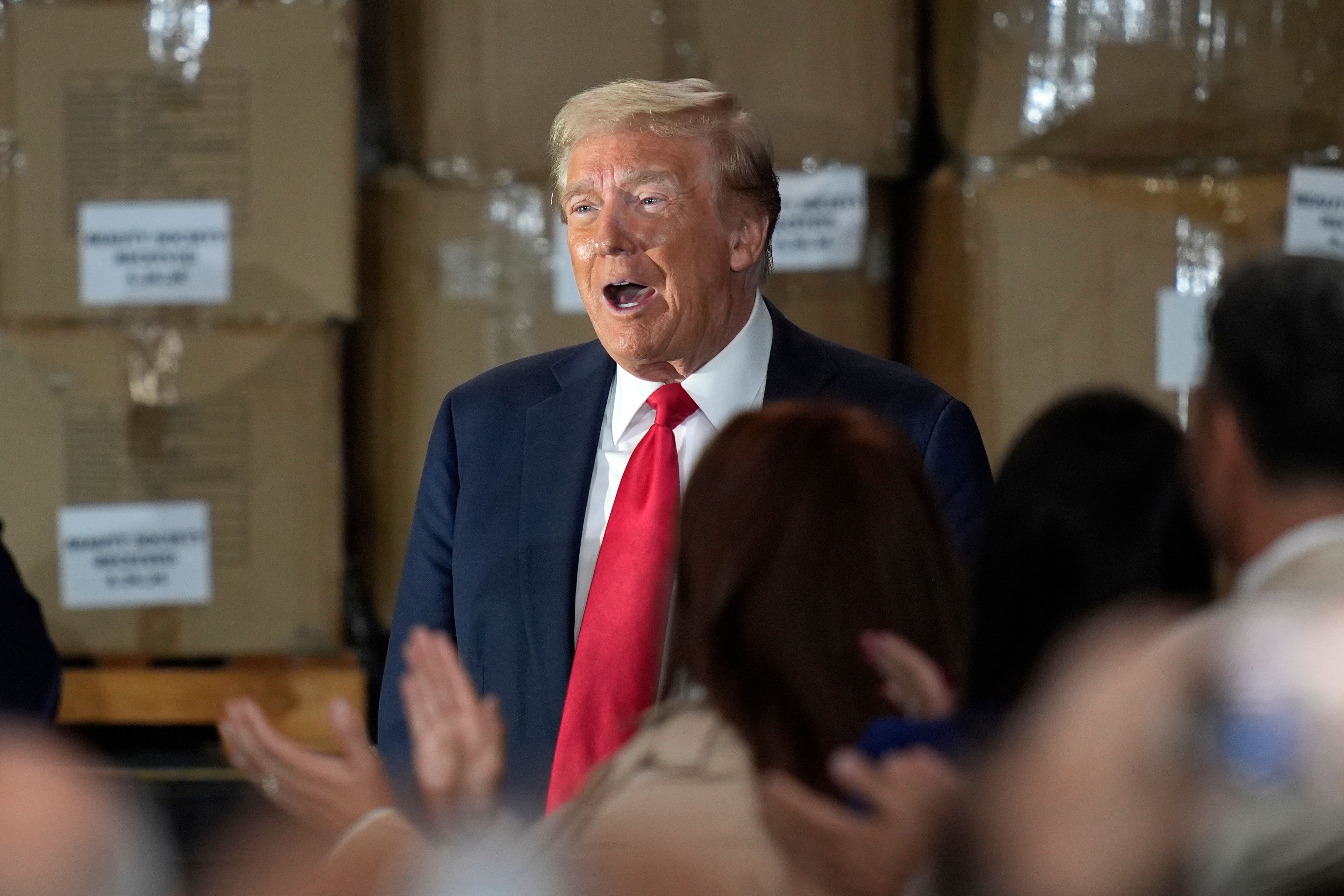 Republican presidential nominee former President Donald Trump arrives to speak at a campaign event at Beauty Society, Saturday, Oct. 12, 2024, in North Las Vegas, Nev. (AP Photo/John Locher)