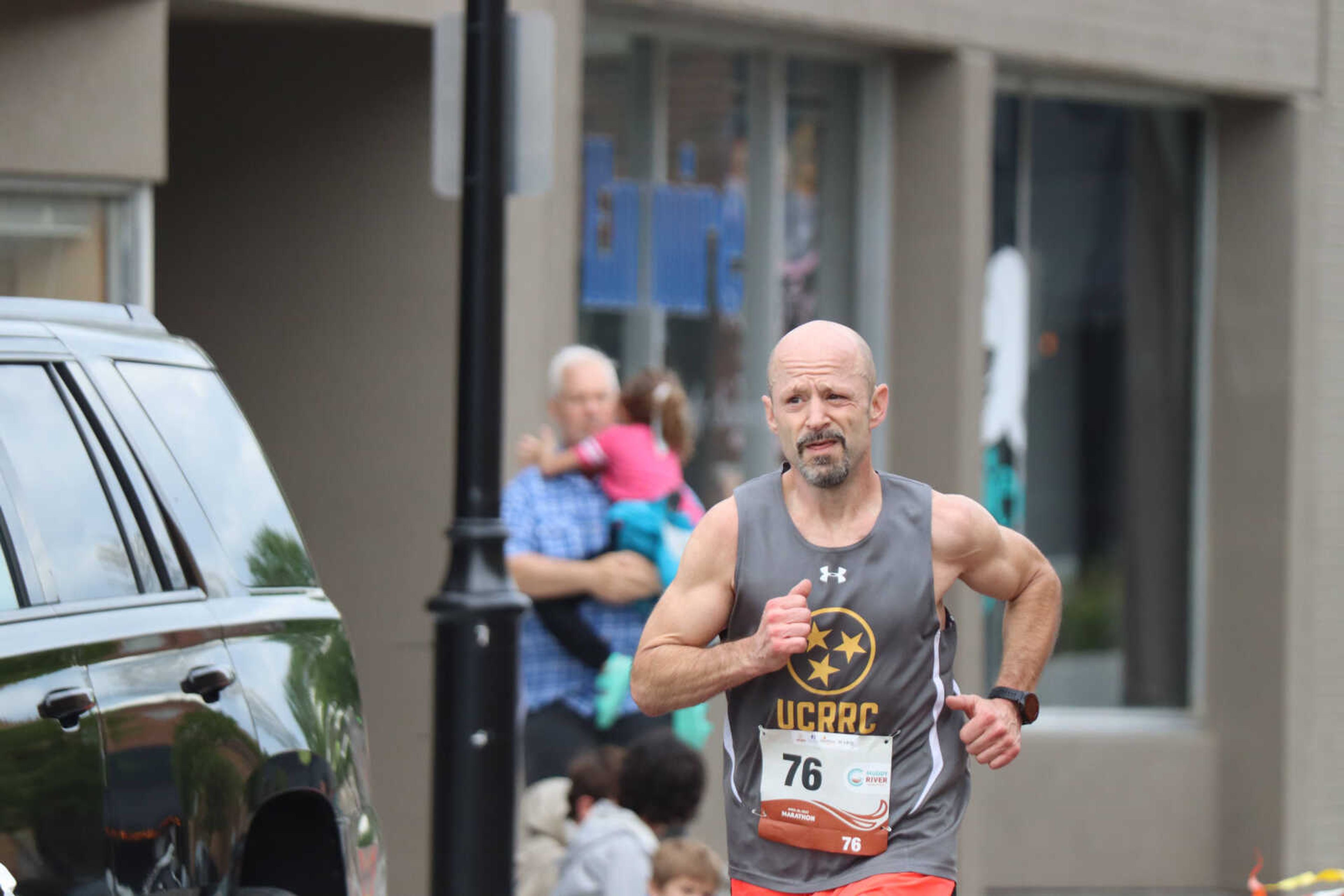 Marathon runner Travis Shope tirelessly running to his 4th place in the marathon.