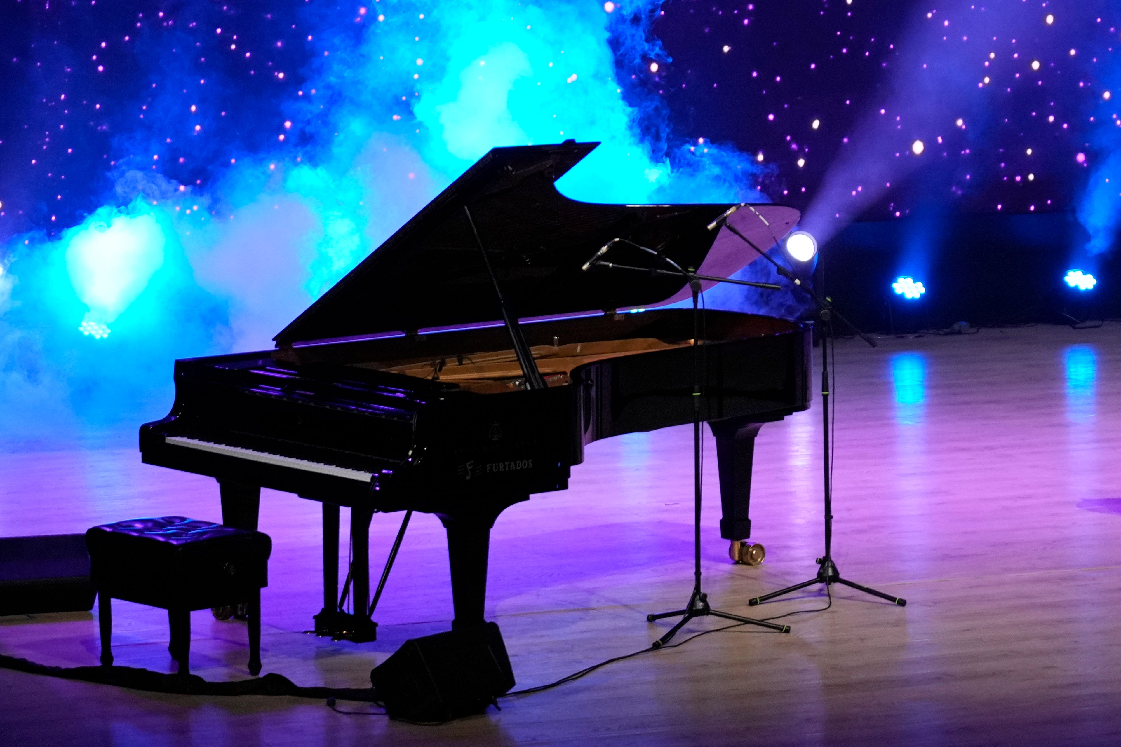 The performance piano stands on stage after the final performance of Takosangba Jamir, 27, a blind pianist, at the two-day Brillante Piano Festival in Bengaluru, India, Sunday, Sept. 29, 2024. (AP Photo/Aijaz Rahi)