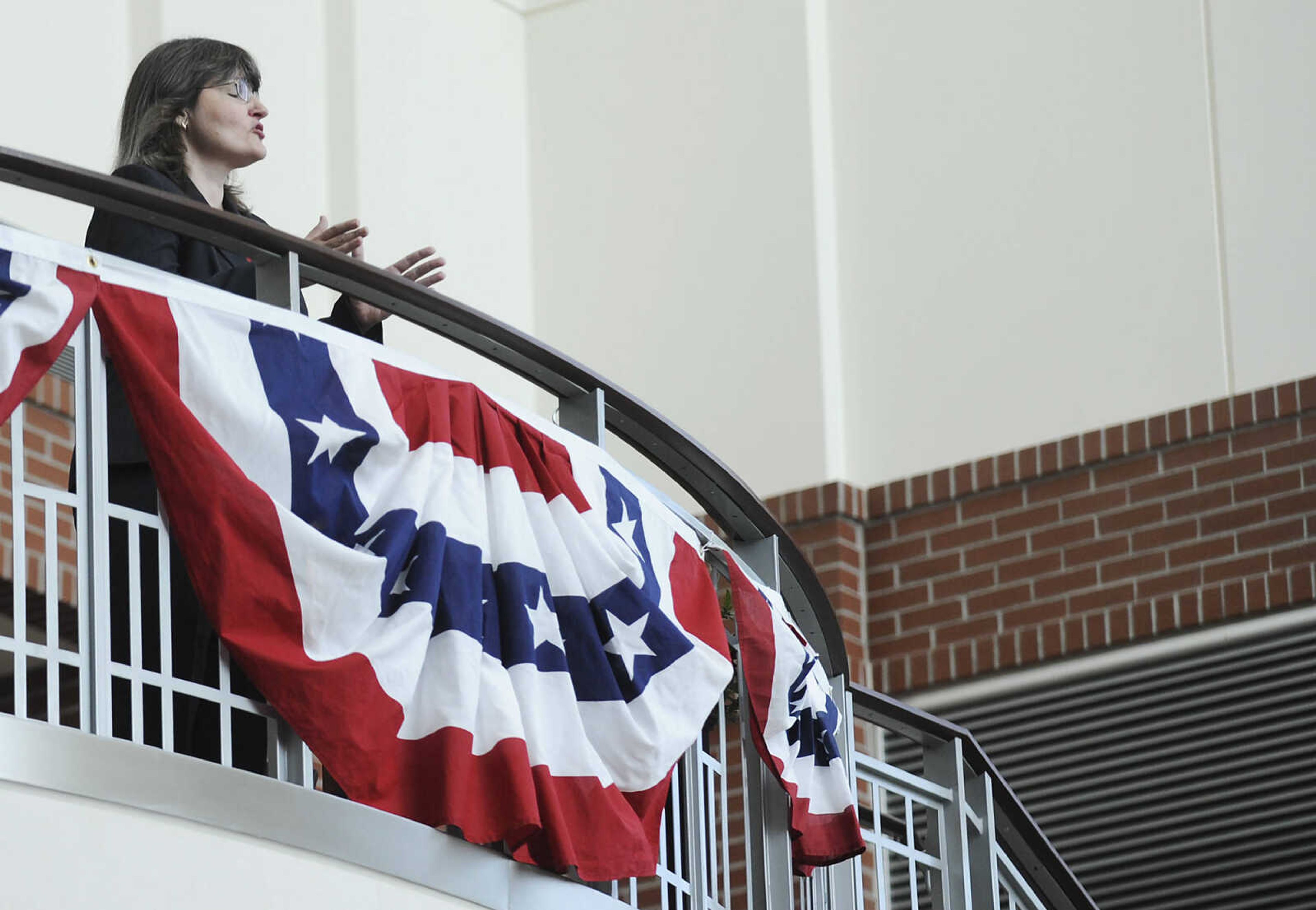 Trudy Lee sings "America the Beautiful," during a naturalization ceremony Wednesday, May 1, at the Rush H. Limbaugh Sr. U.S. Courthouse in Cape Girardeau. U.S. District Court Judge Stephen N. Limbaugh Jr. administered the Oath of Allegiance to 29 people from 11 countries, making them U.S. citizens, during the ceremony.