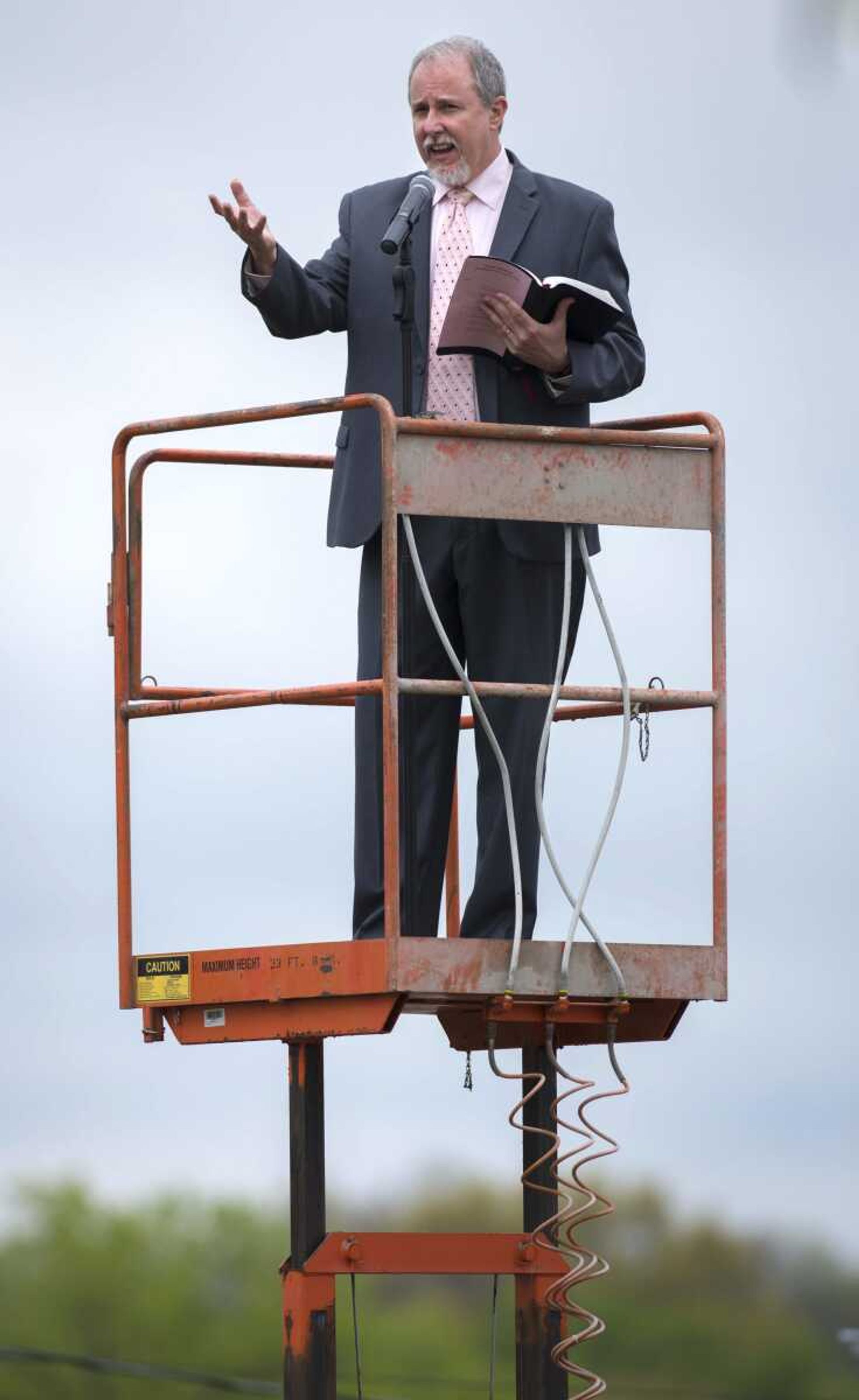 First Baptist Jackson senior pastor Troy Richards delivers a sermon to more than 50 vehicles in attendance at the church's drive-in service held Easter Sunday, April 12, 2020, in Jackson.