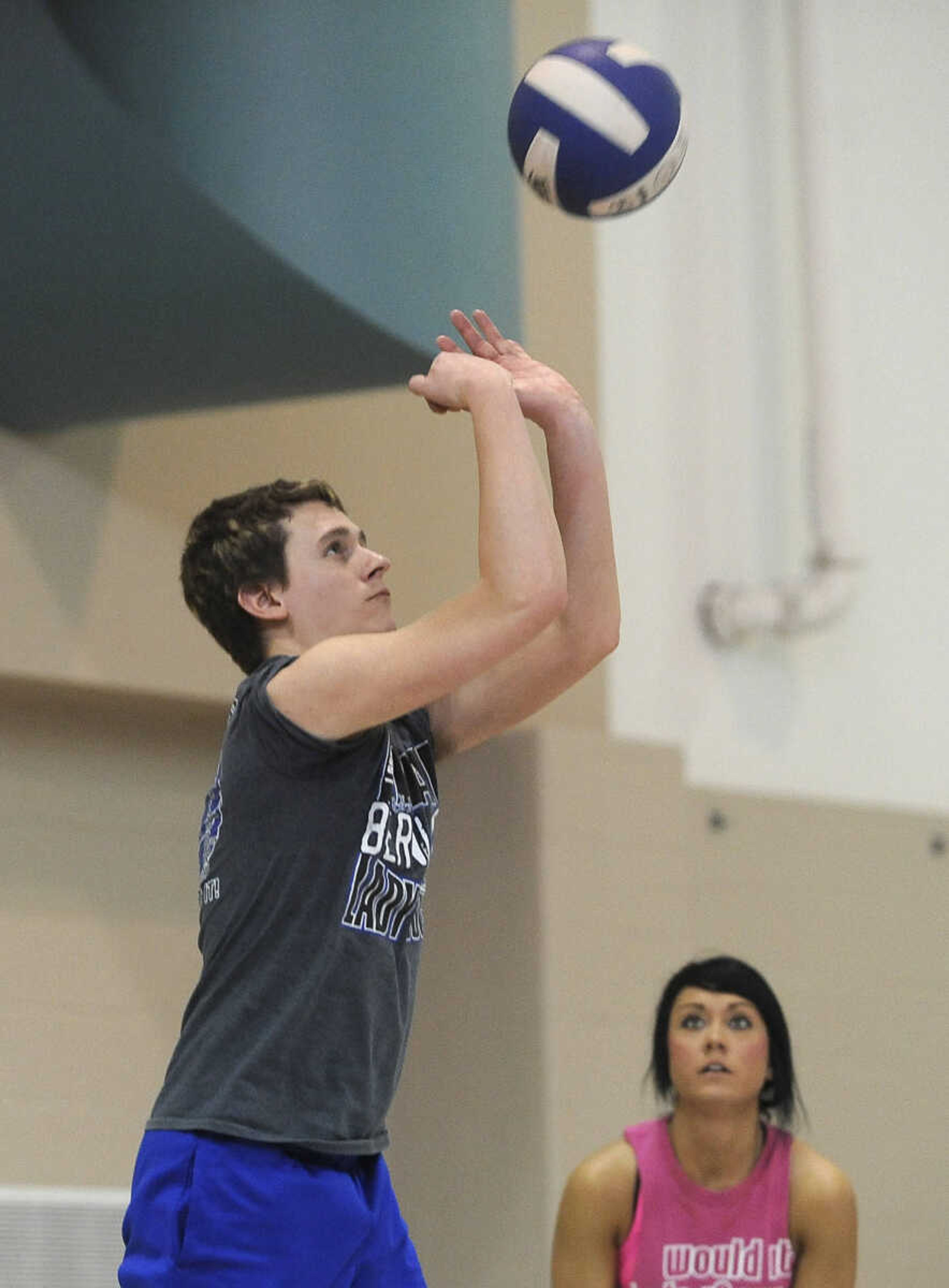 Cody Snider of the Unprotected Sets team returns a volley in the Osage Invitational Co-ed Volleyball Tournament Sunday, March 1, 2015 at the Osage Centre.