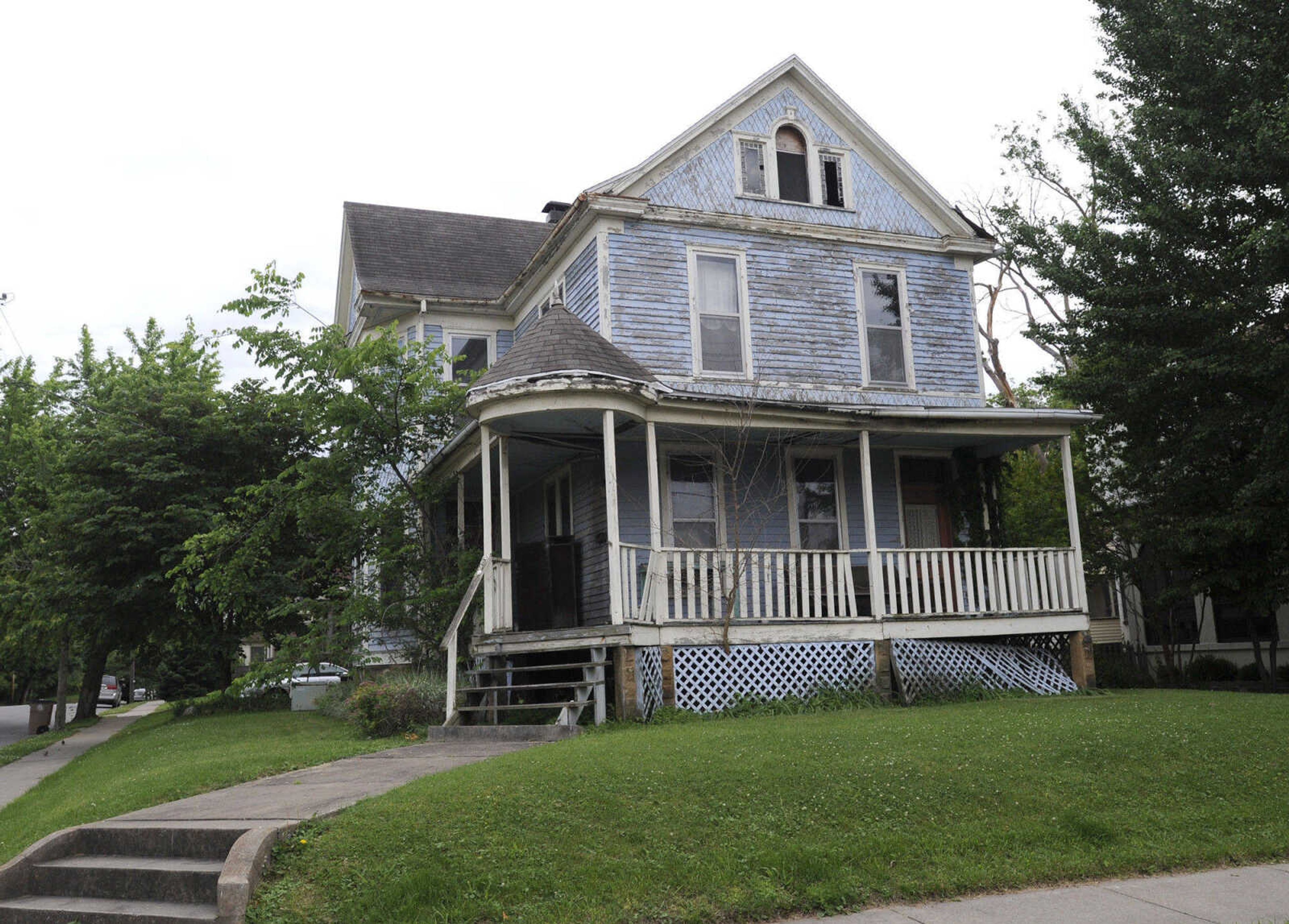 The Davis House, 401 Themis, is a Victorian Queen Anne structure. Ben and Olivia Davis purchased the land from Louis Houck in 1889 and began building their home.  Mr. Davis was a lawyer and then became a judge (1904-1908). The current owners hope to renovate the house.