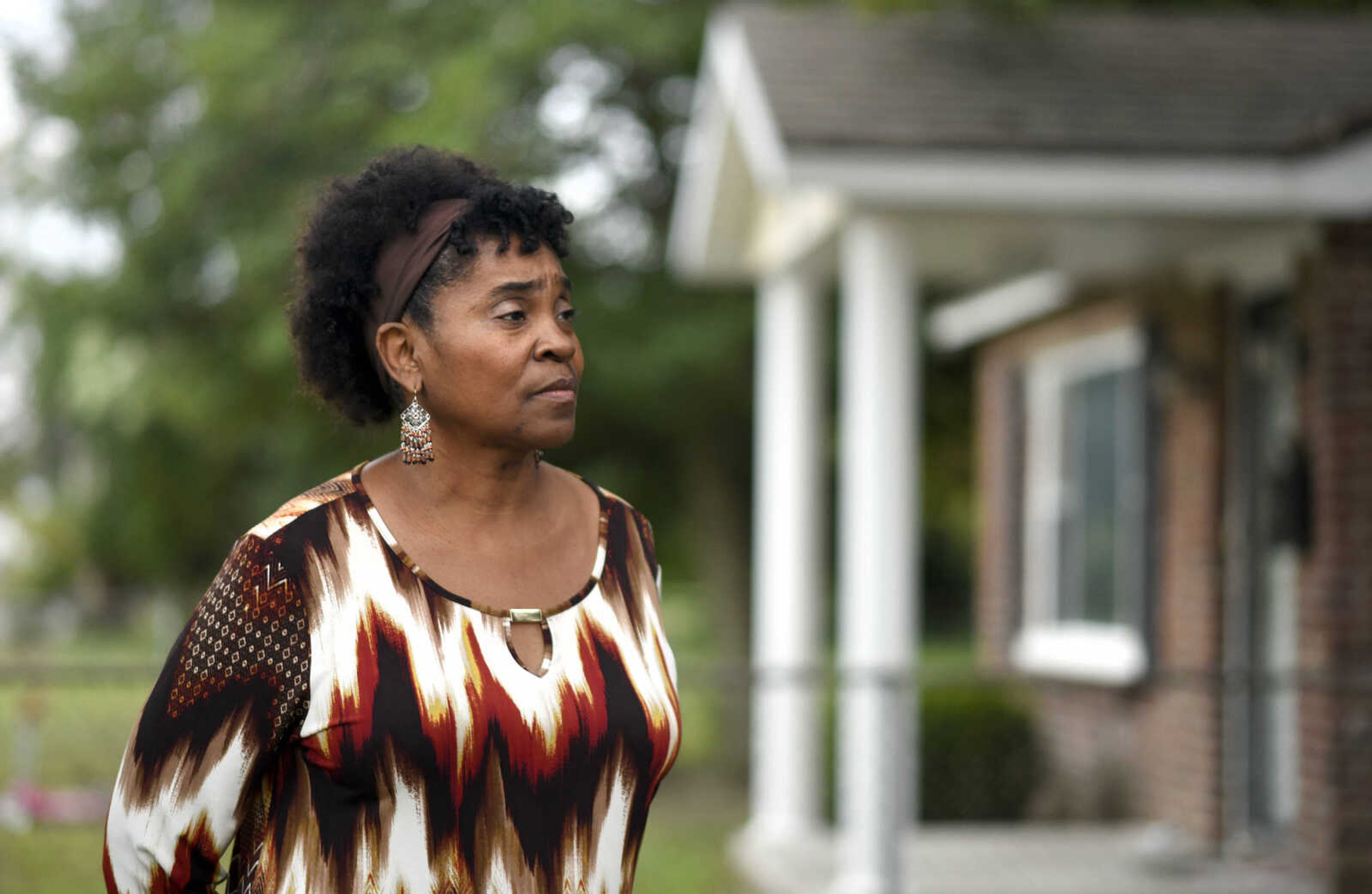 LAURA SIMON ~ lsimon@semissourian.com

Agnes Mason stands outside the house at 333 Dixie Street in Sikeston, Missouri in September. Mason was at the house for a fish fry on the night of Aug. 5, 2000.